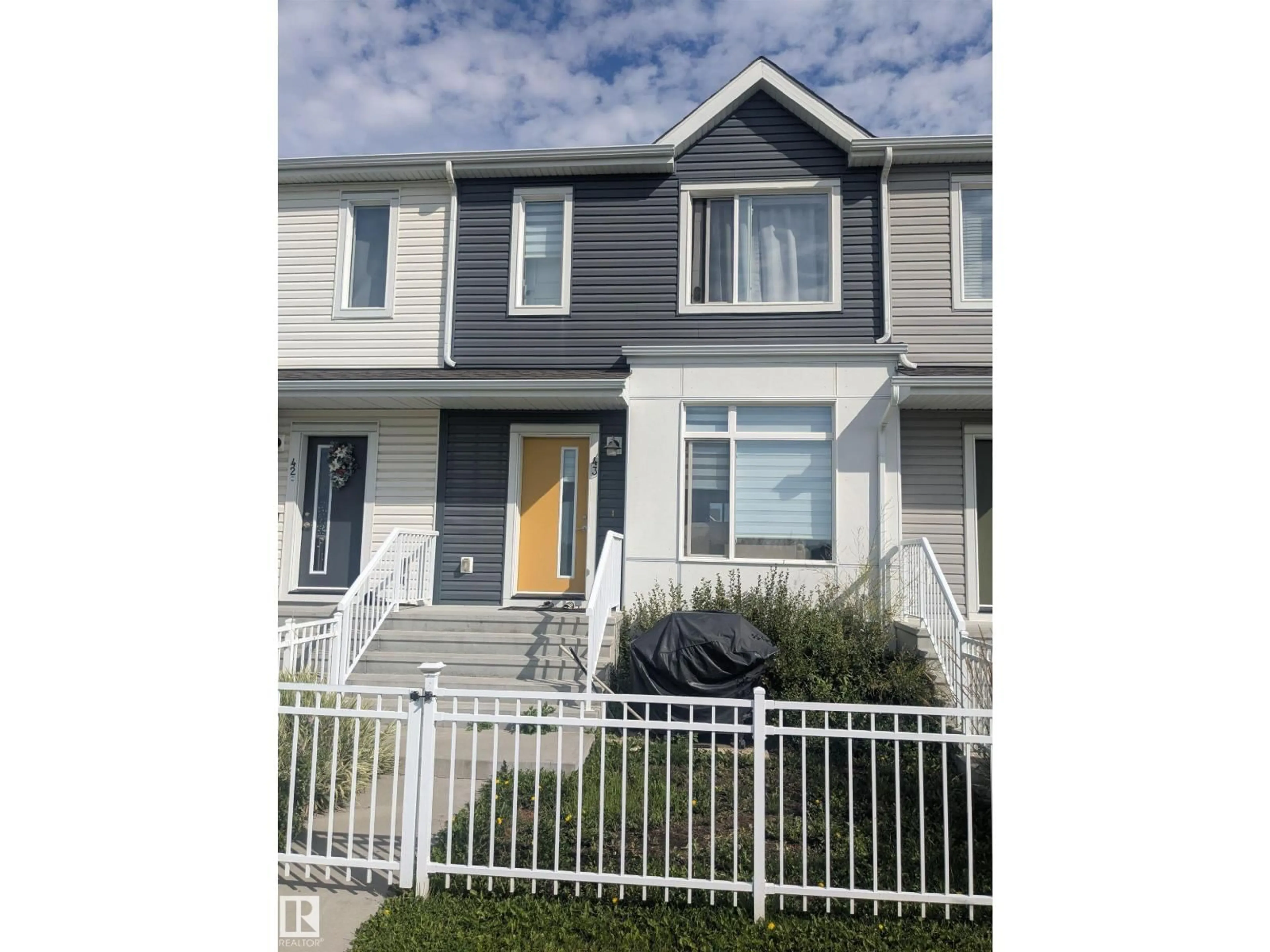 Home with vinyl exterior material, street for 43 215 SADDLEBACK RD, Edmonton Alberta T6J5T6