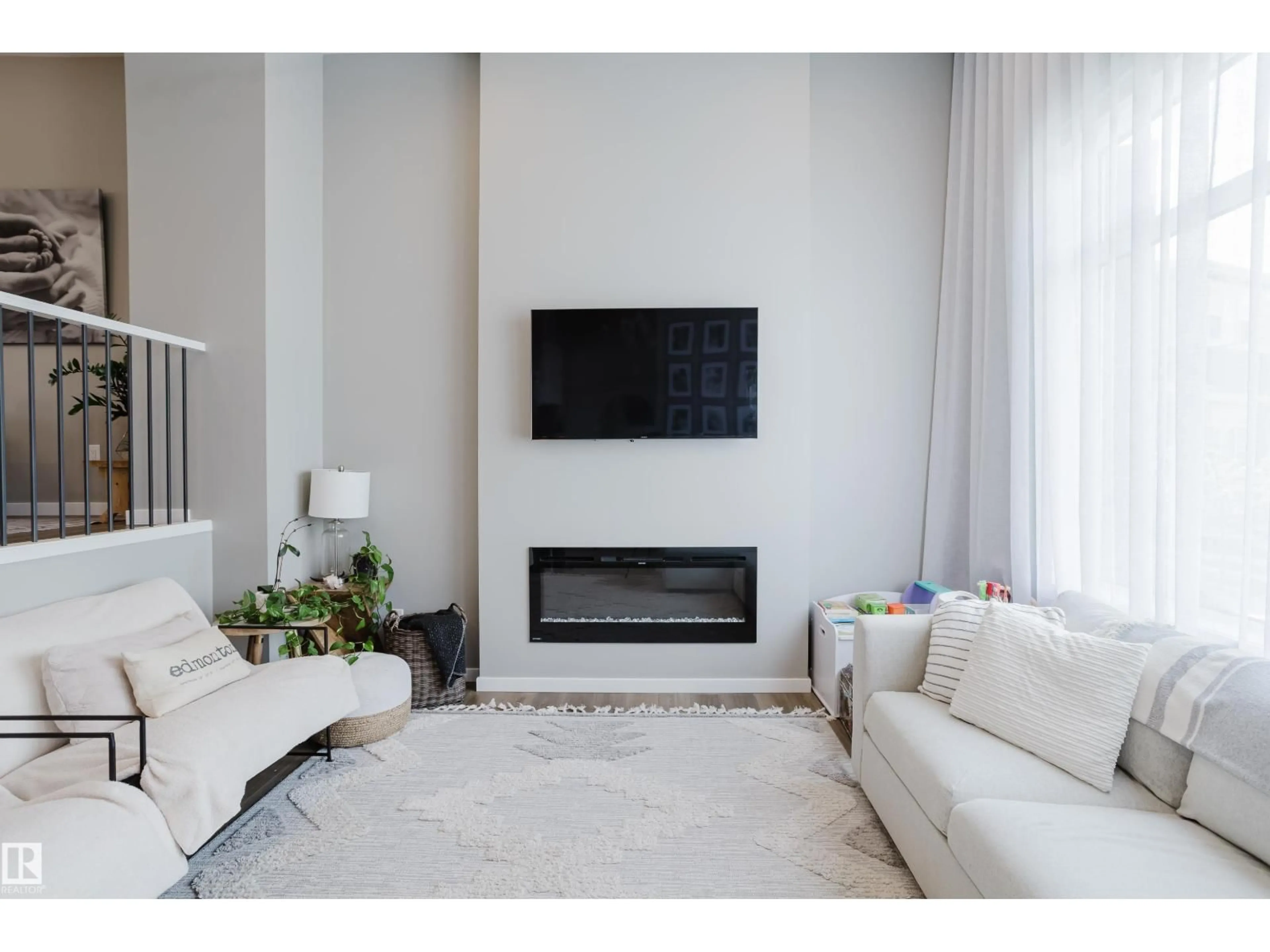 Living room with furniture, unknown for 411 37 AV, Edmonton Alberta T6T2L7