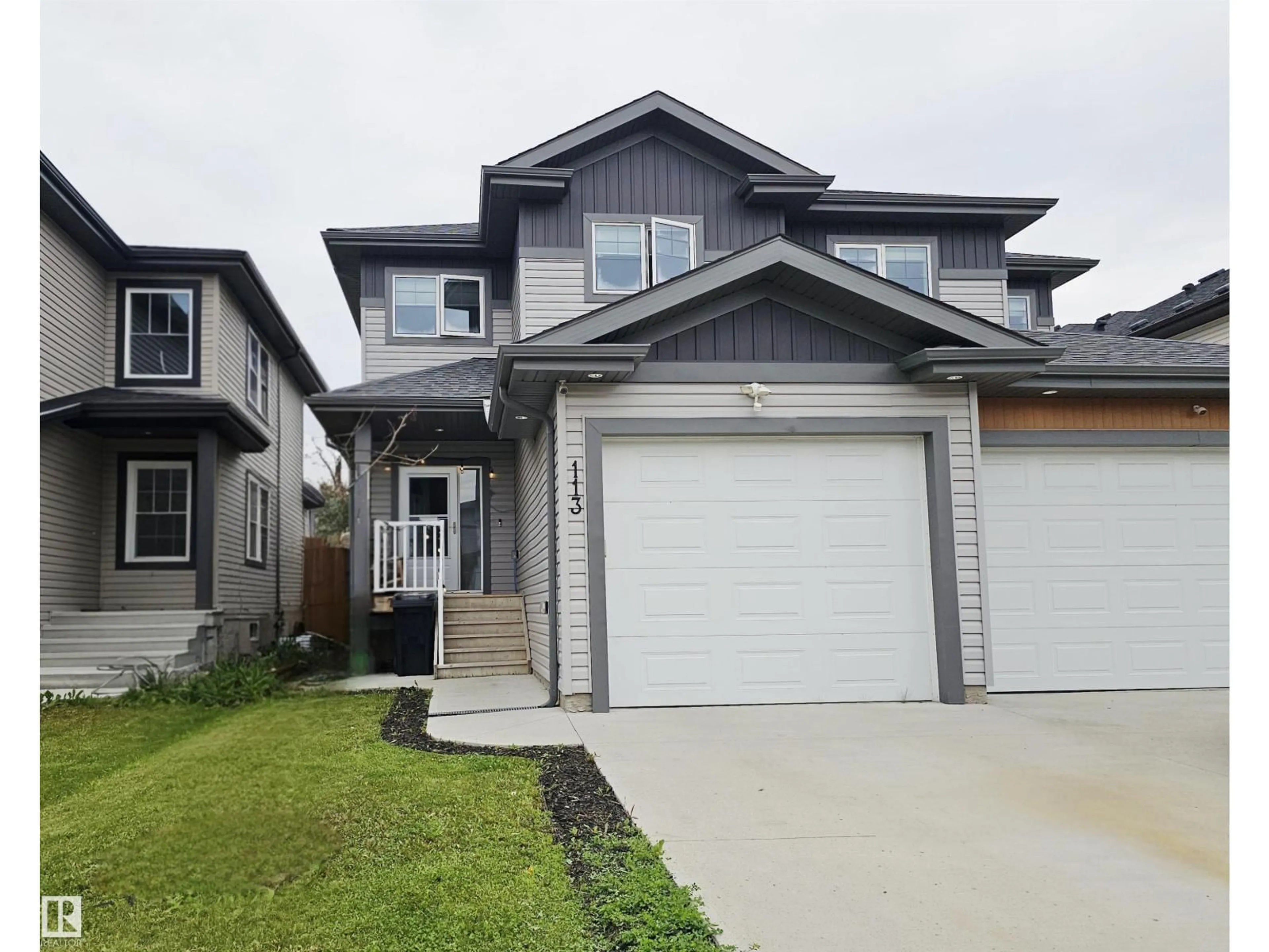 Home with vinyl exterior material, street for 113 RICHMOND LI, Fort Saskatchewan Alberta T8L0S6