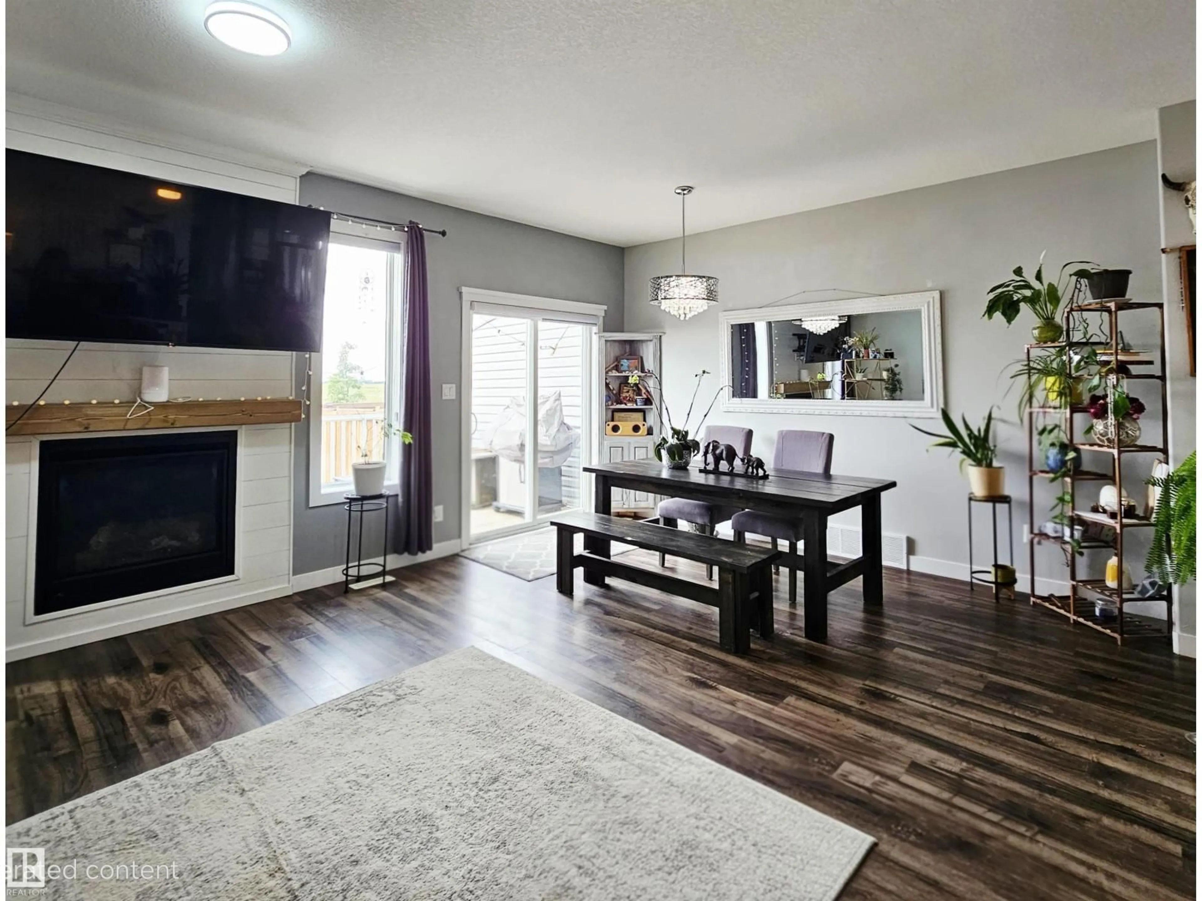 Living room with furniture, wood/laminate floor for 113 RICHMOND LI, Fort Saskatchewan Alberta T8L0S6
