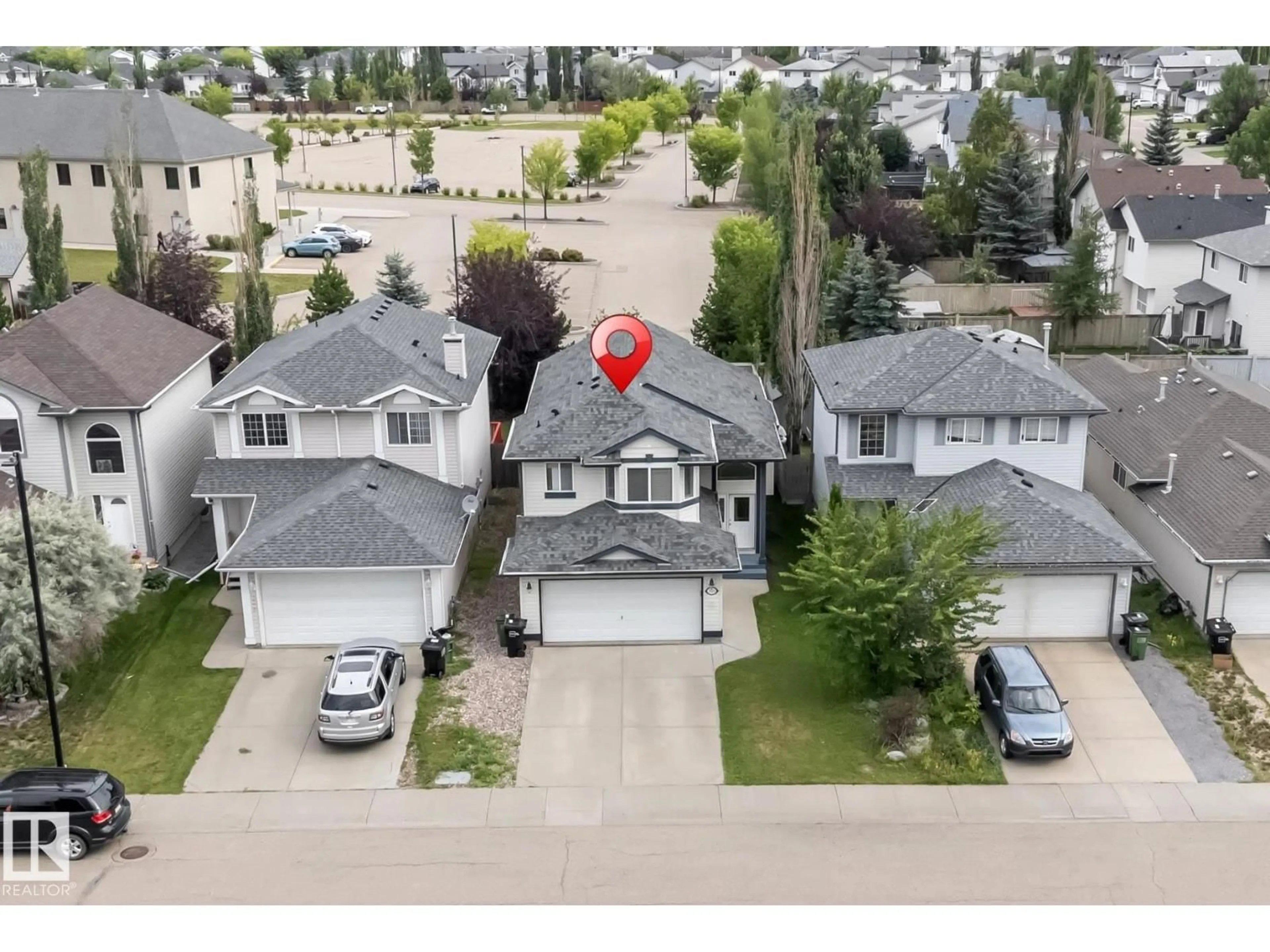A pic from outside/outdoor area/front of a property/back of a property/a pic from drone, street for 3320 27 AV, Edmonton Alberta T6T1P7