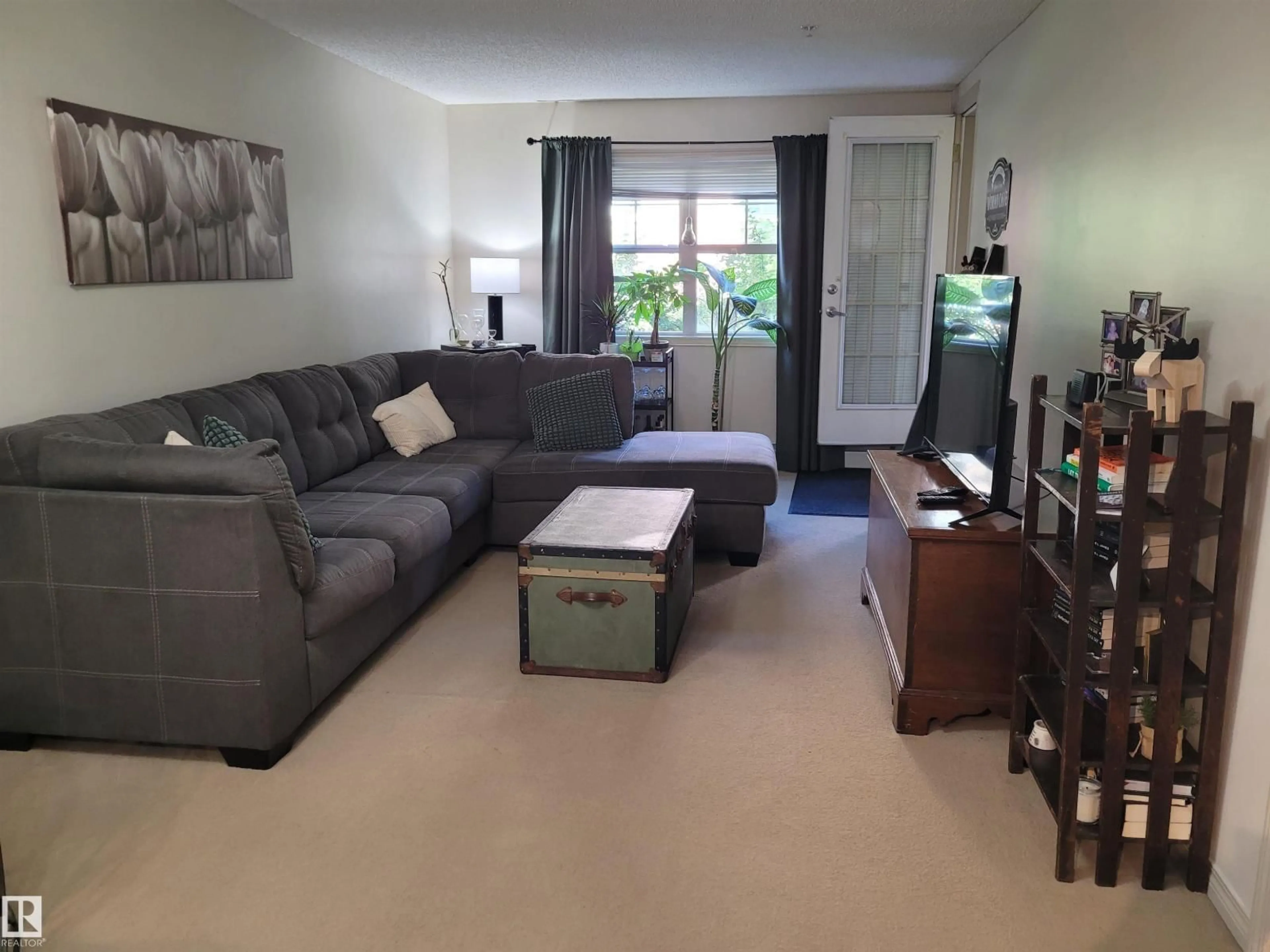 Living room with furniture, unknown for #105 - 11449 ELLERSLIE RD, Edmonton Alberta T6W1T2