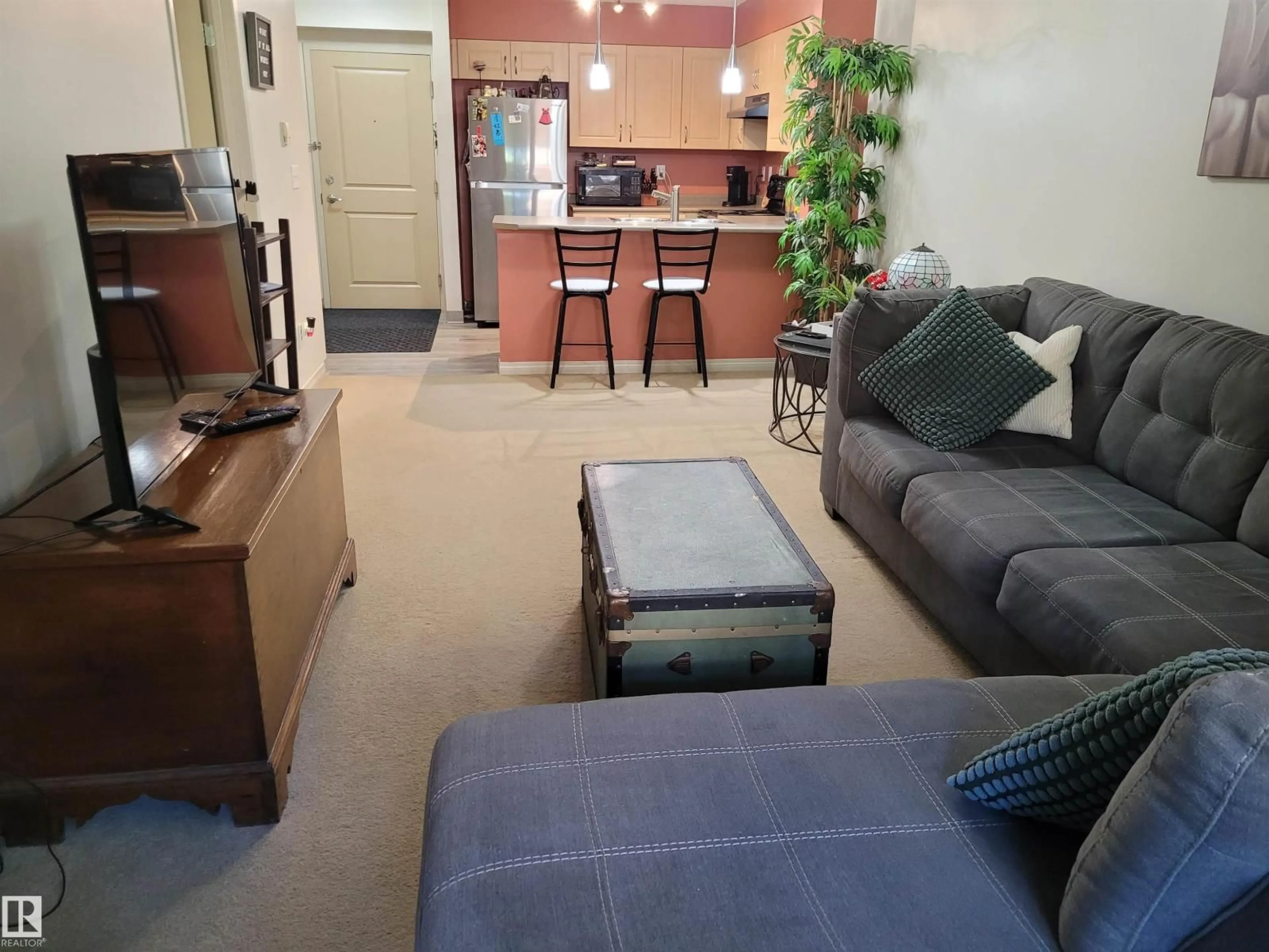 Living room with furniture, unknown for #105 - 11449 ELLERSLIE RD, Edmonton Alberta T6W1T2