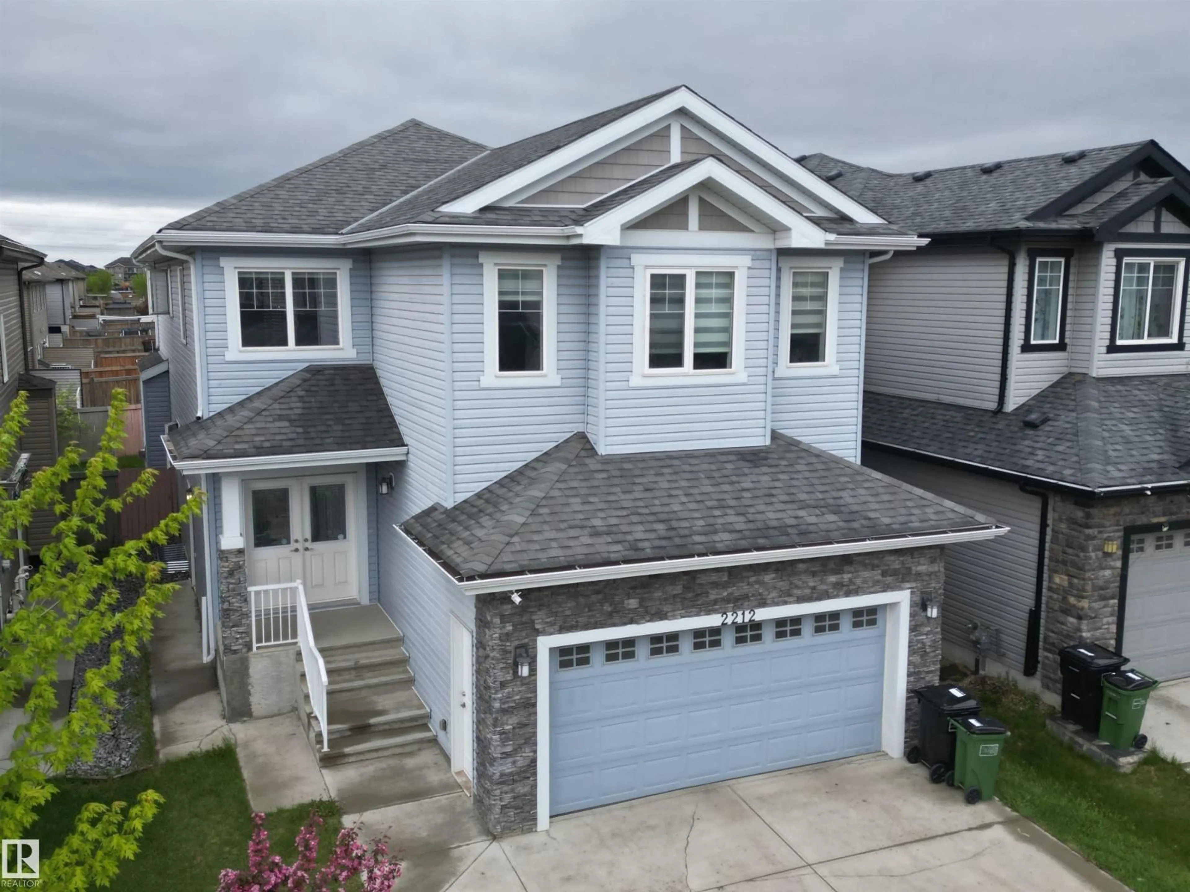 A pic from outside/outdoor area/front of a property/back of a property/a pic from drone, street for 2212 22 ST, Edmonton Alberta T6T0Z1