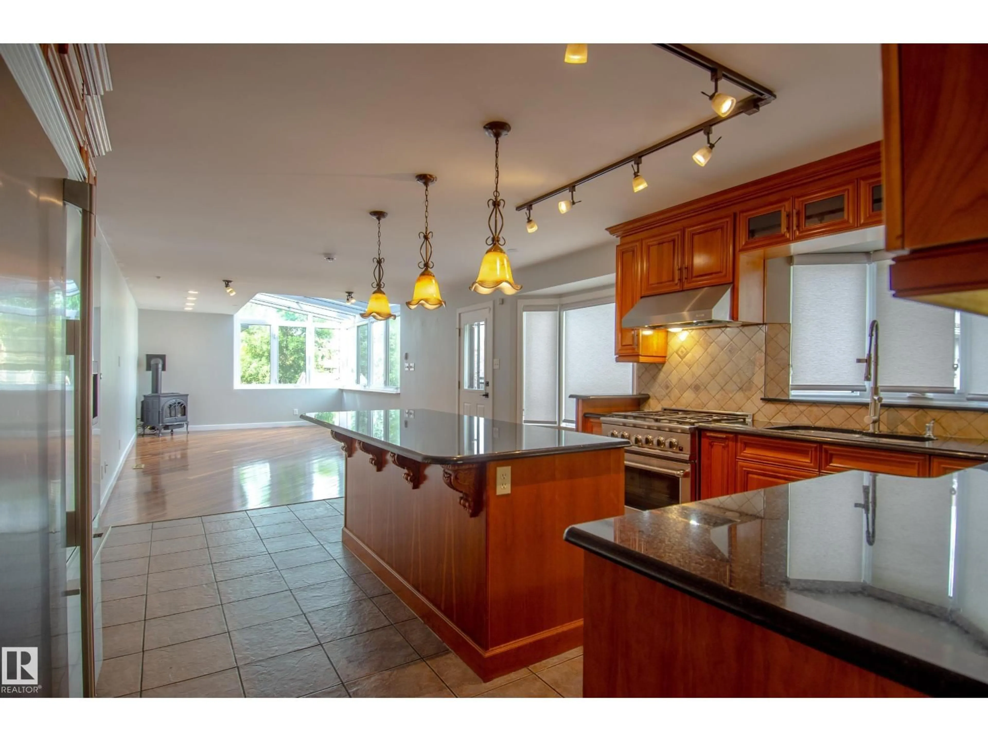 Open concept kitchen, ceramic/tile floor for 843 WANYANDI RD, Edmonton Alberta T5T2X3