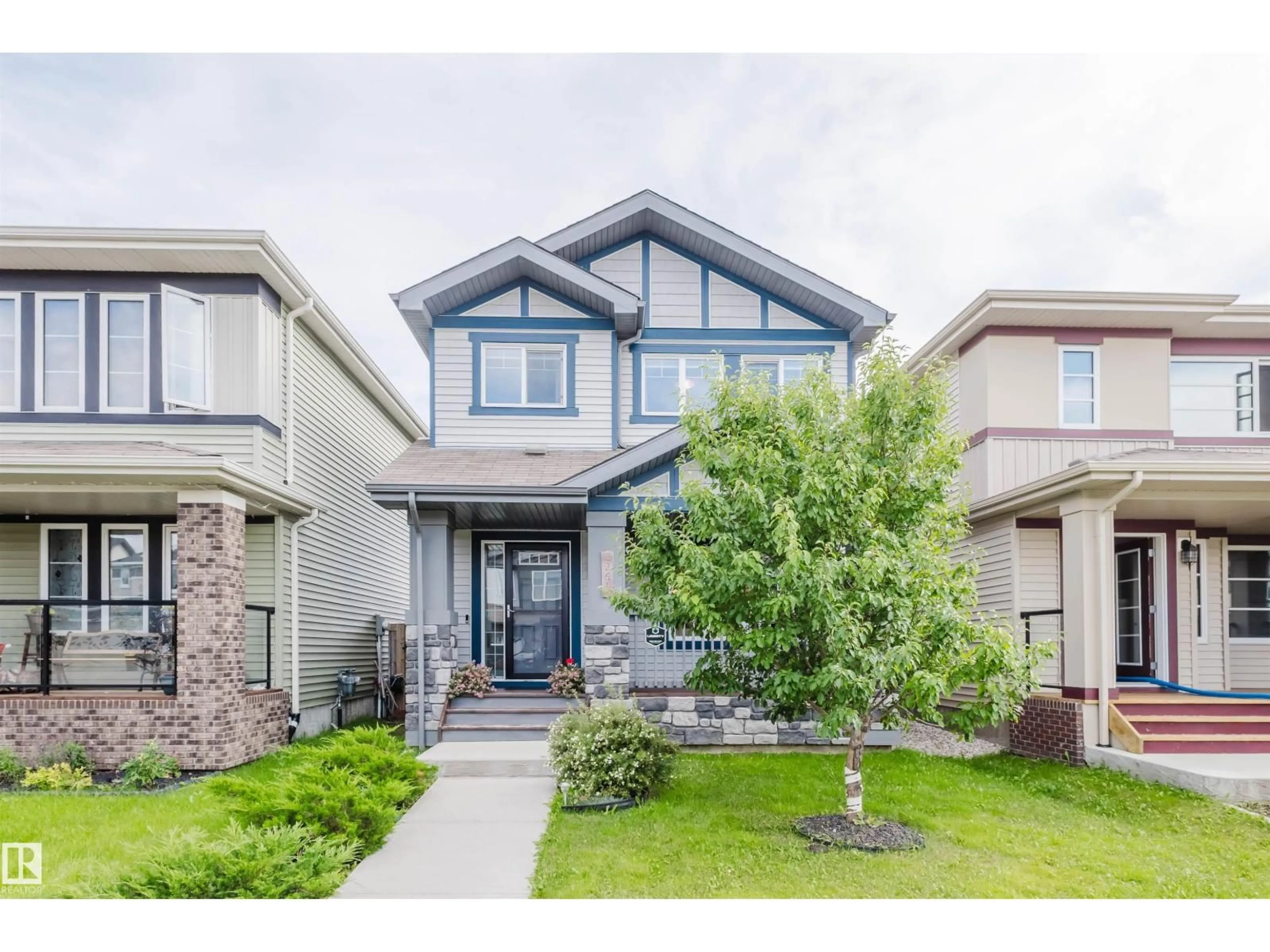 Home with vinyl exterior material, street for 2261 CASEY CR, Edmonton Alberta T6W3M8