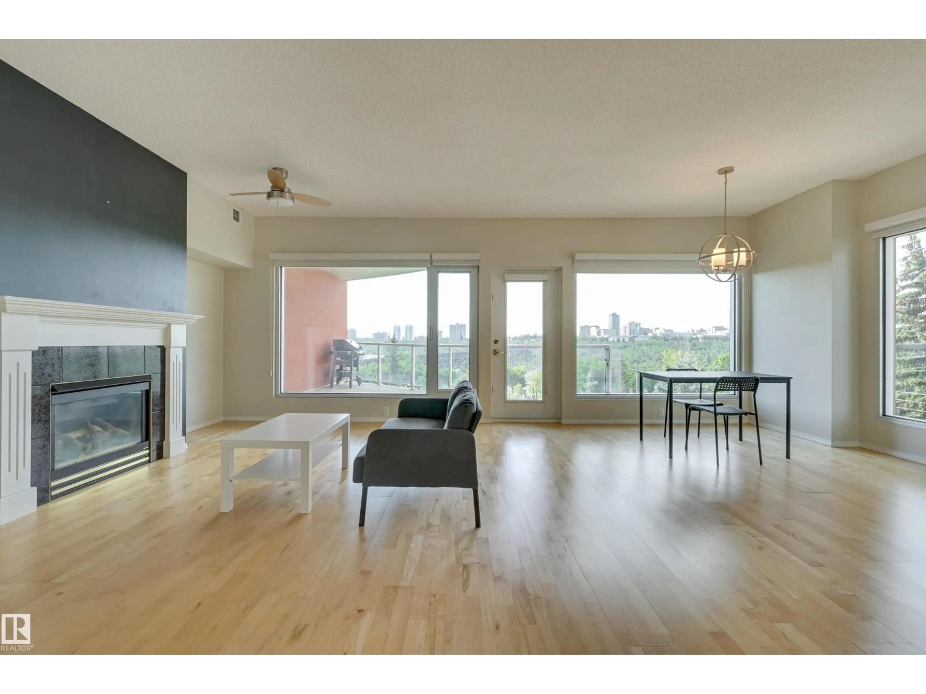 Living room with furniture, wood/laminate floor for 501 - 9708 110 ST NW, Edmonton Alberta T5K2W3