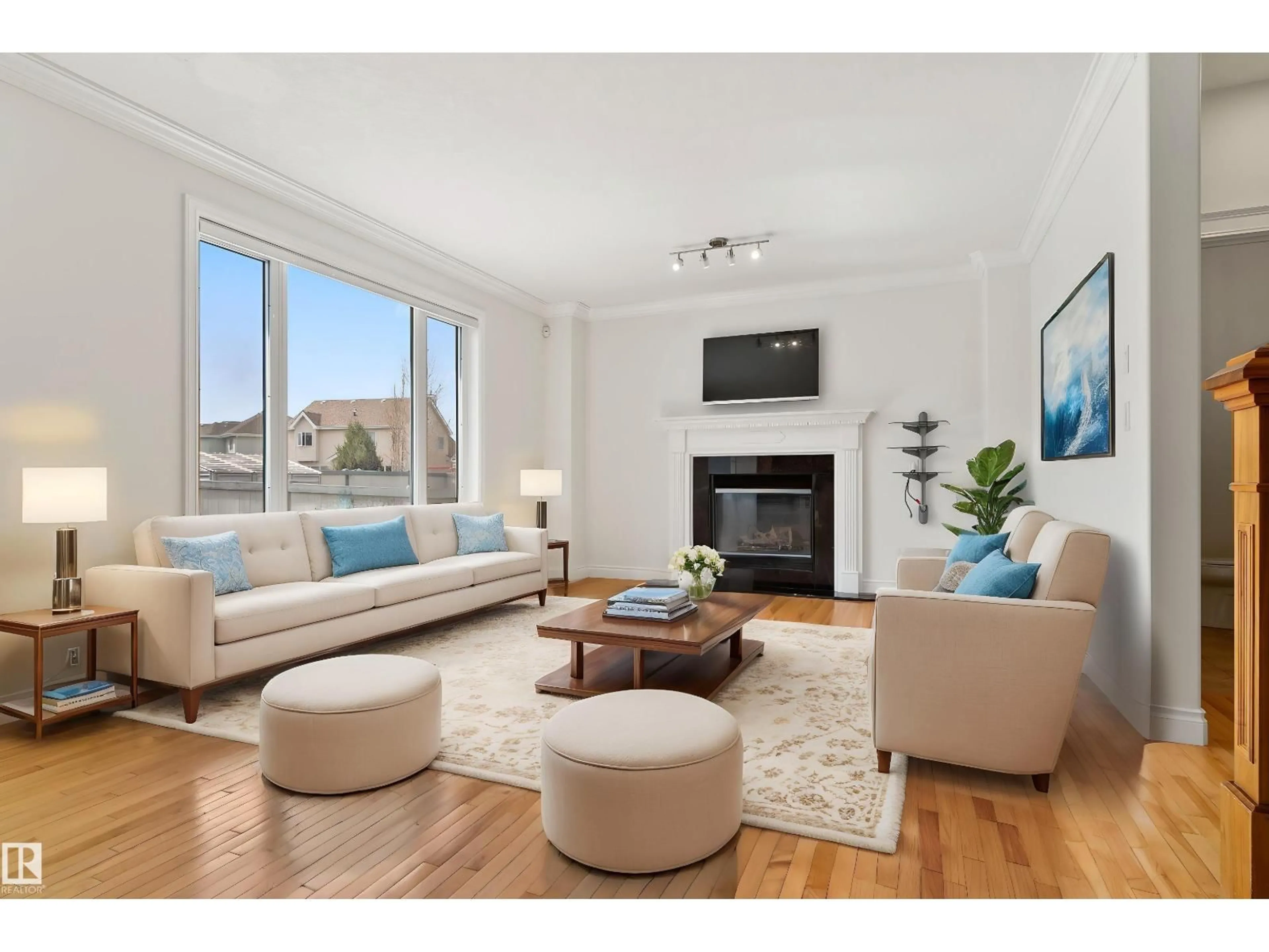 Living room with furniture, wood/laminate floor for 558 STEWART CR, Edmonton Alberta T6X1B5
