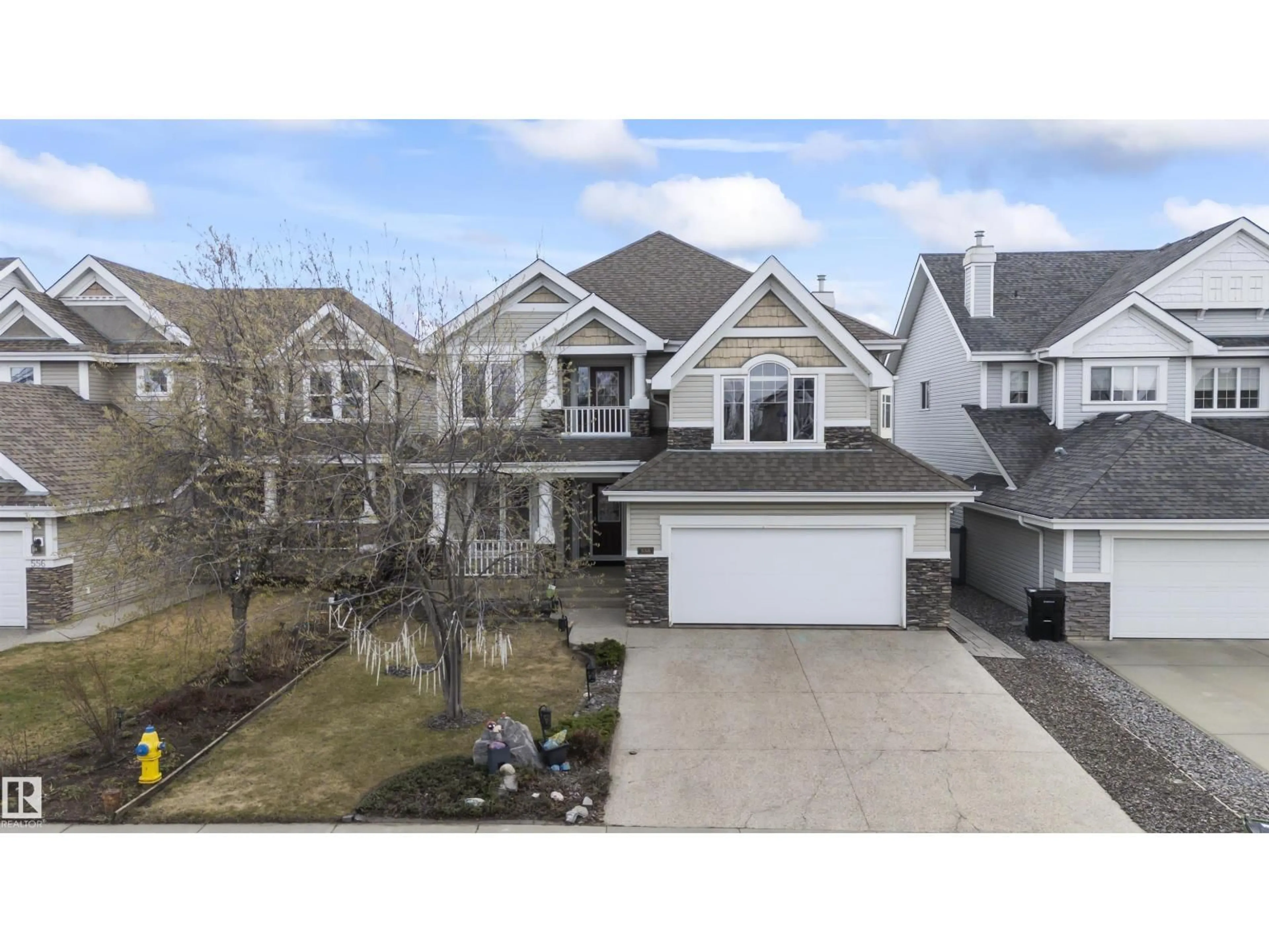 A pic from outside/outdoor area/front of a property/back of a property/a pic from drone, street for 558 STEWART CR, Edmonton Alberta T6X1B5