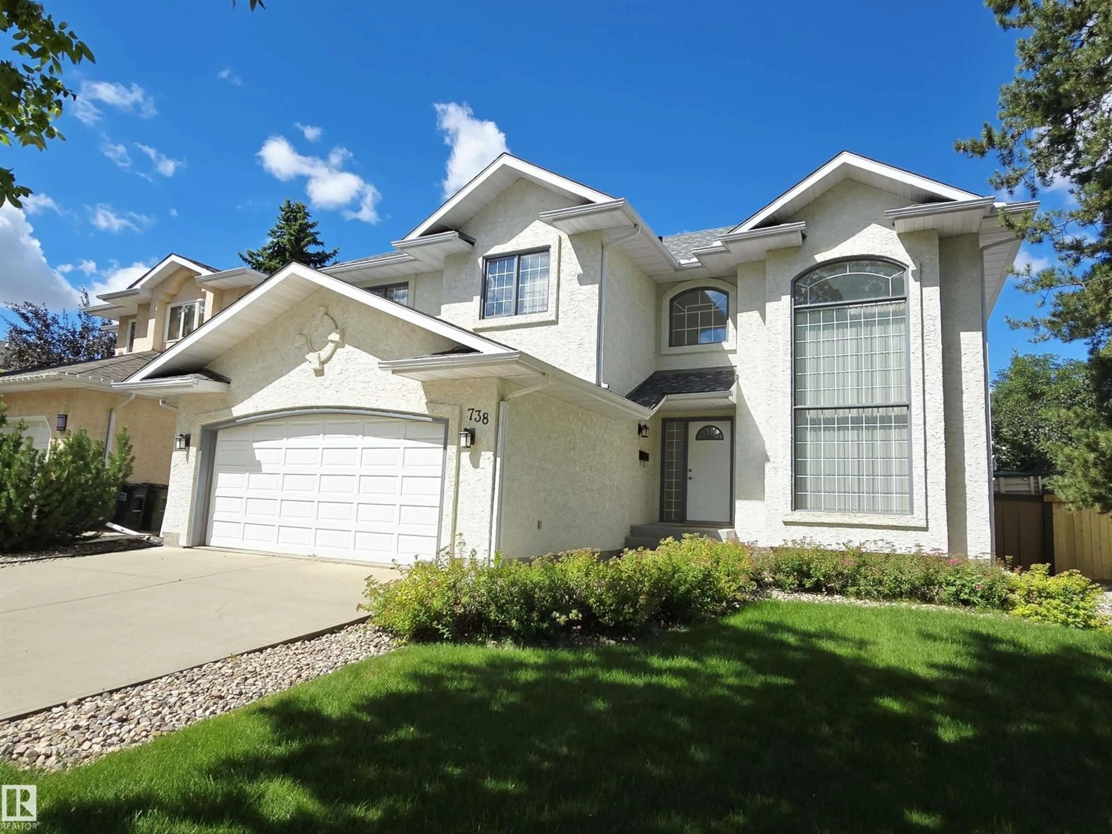Home with vinyl exterior material, street for 738 BURTON CR, Edmonton Alberta T6R2J3