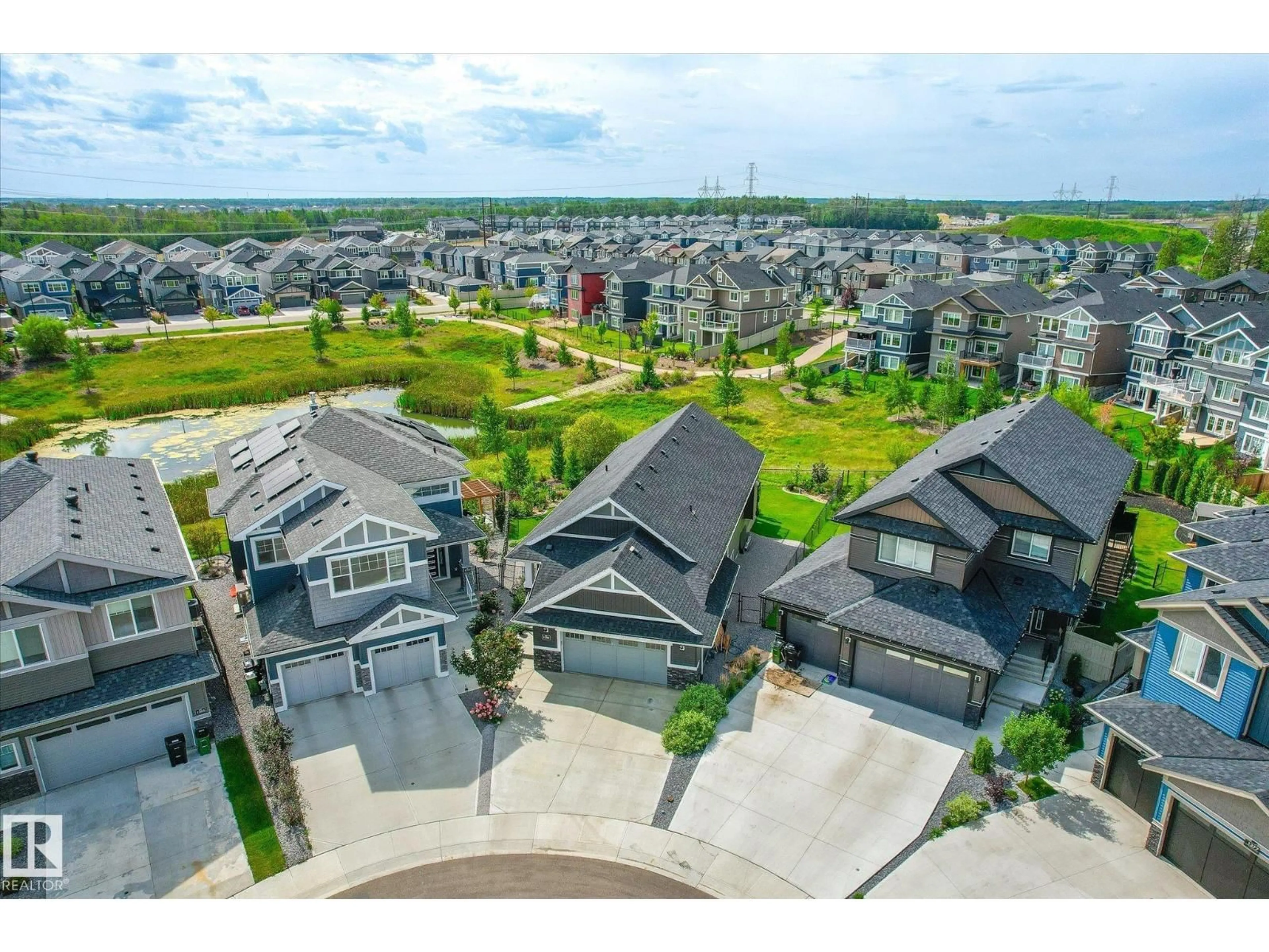 A pic from outside/outdoor area/front of a property/back of a property/a pic from drone, mountain view for 1381 ENRIGHT LANDING LD, Edmonton Alberta T6M0Y9