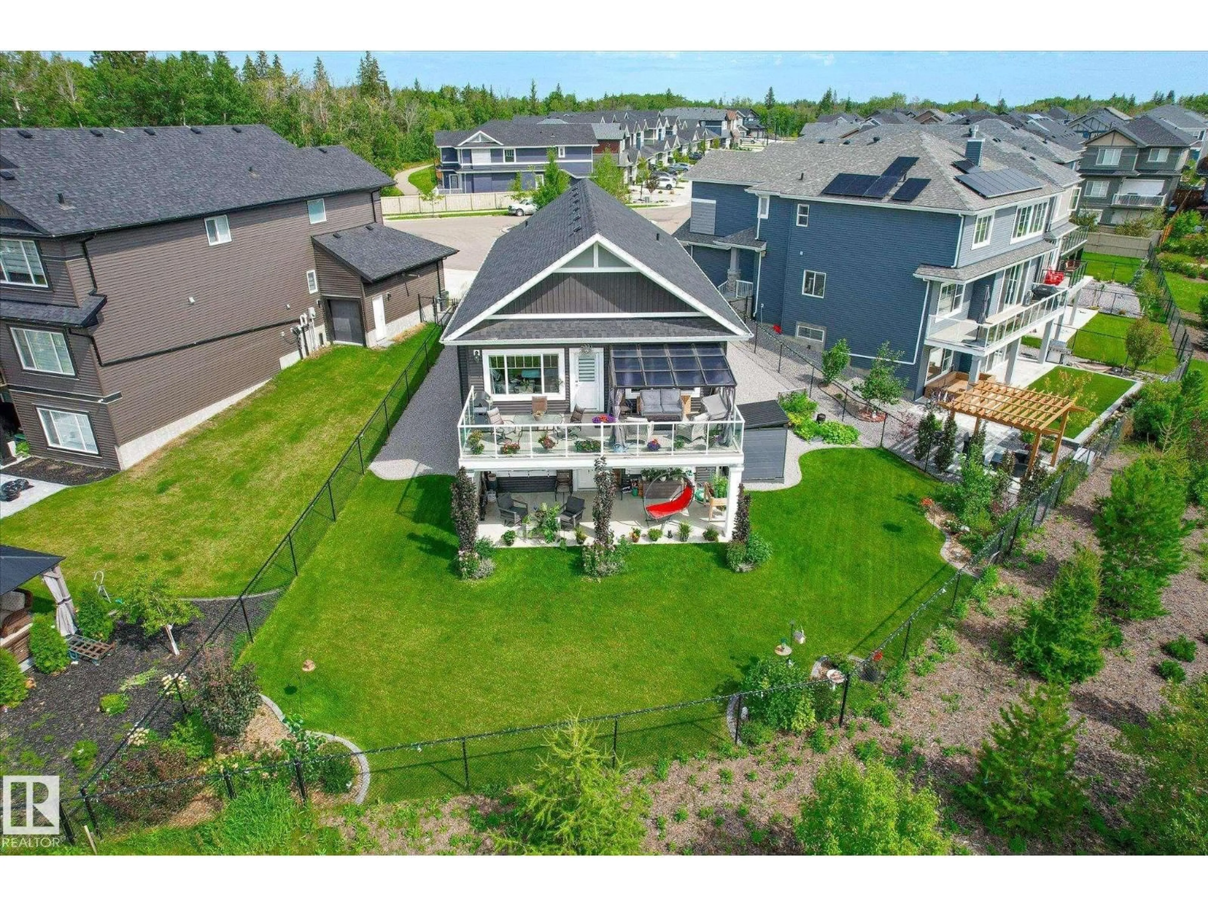 A pic from outside/outdoor area/front of a property/back of a property/a pic from drone, mountain view for 1381 ENRIGHT LANDING LD, Edmonton Alberta T6M0Y9