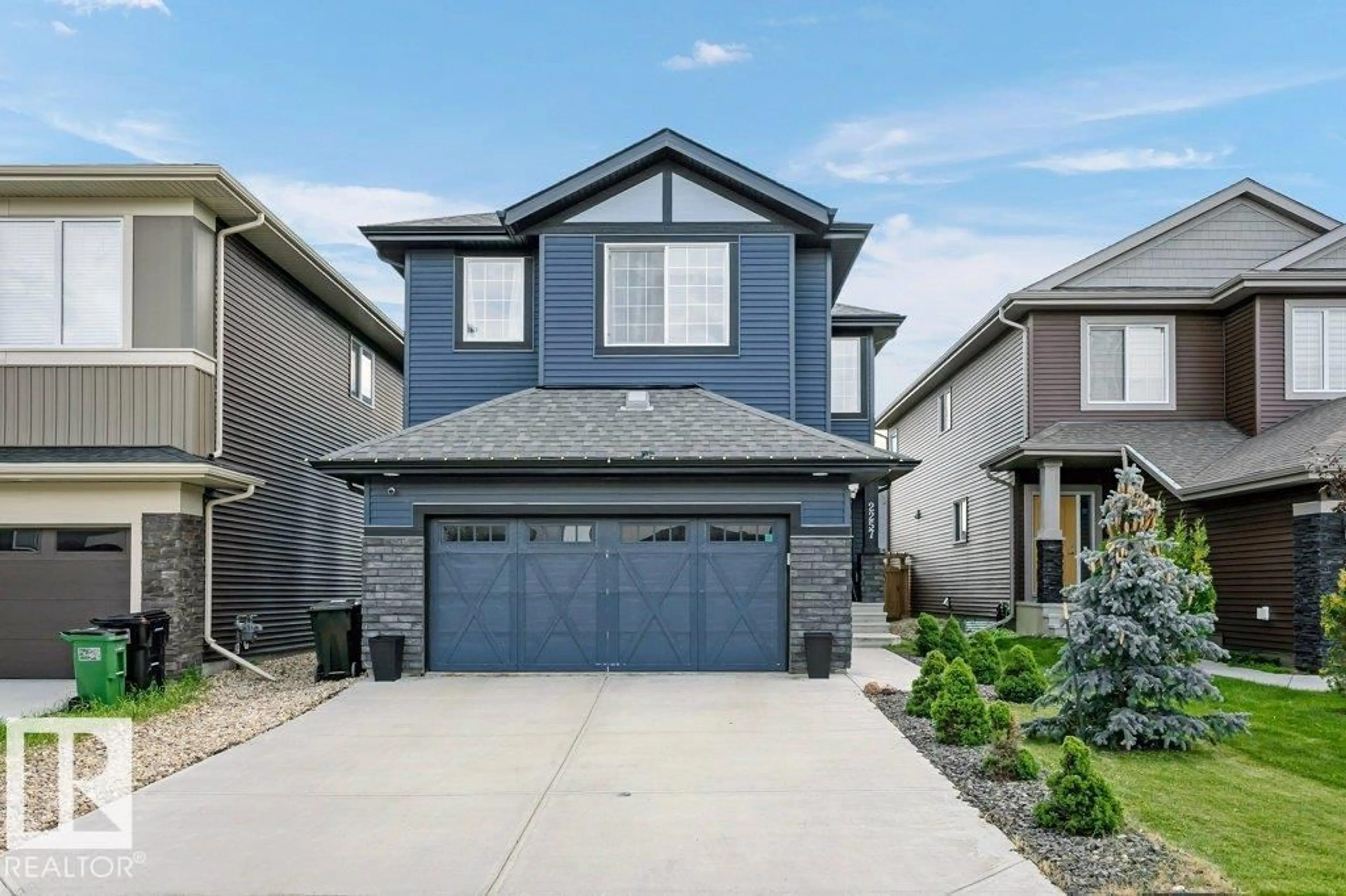 Home with vinyl exterior material, street for SW - 2257 57 ST, Edmonton Alberta T6X2P3