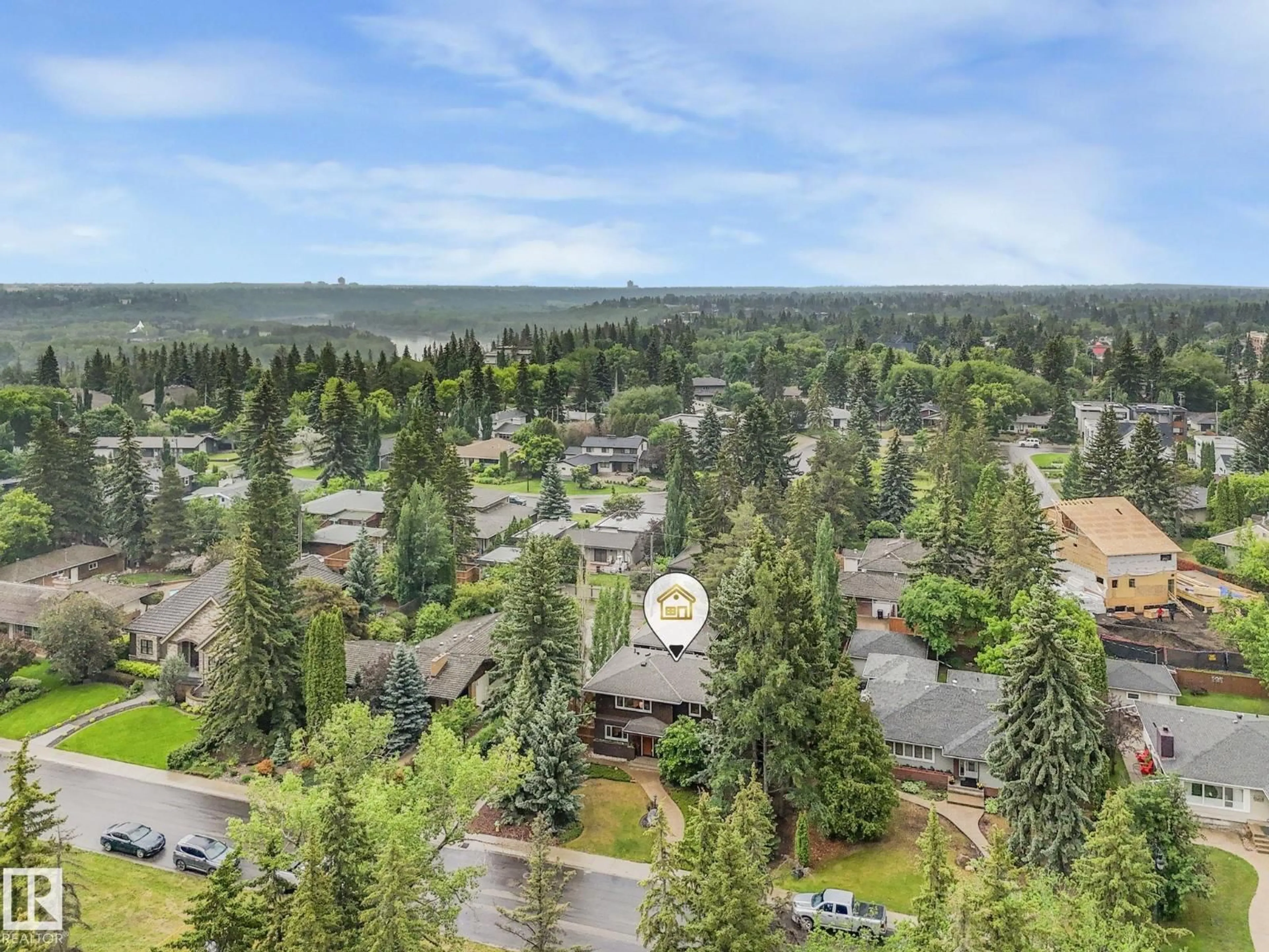 A pic from outside/outdoor area/front of a property/back of a property/a pic from drone, mountain view for 13833 SUMMIT DR, Edmonton Alberta T5N3S8