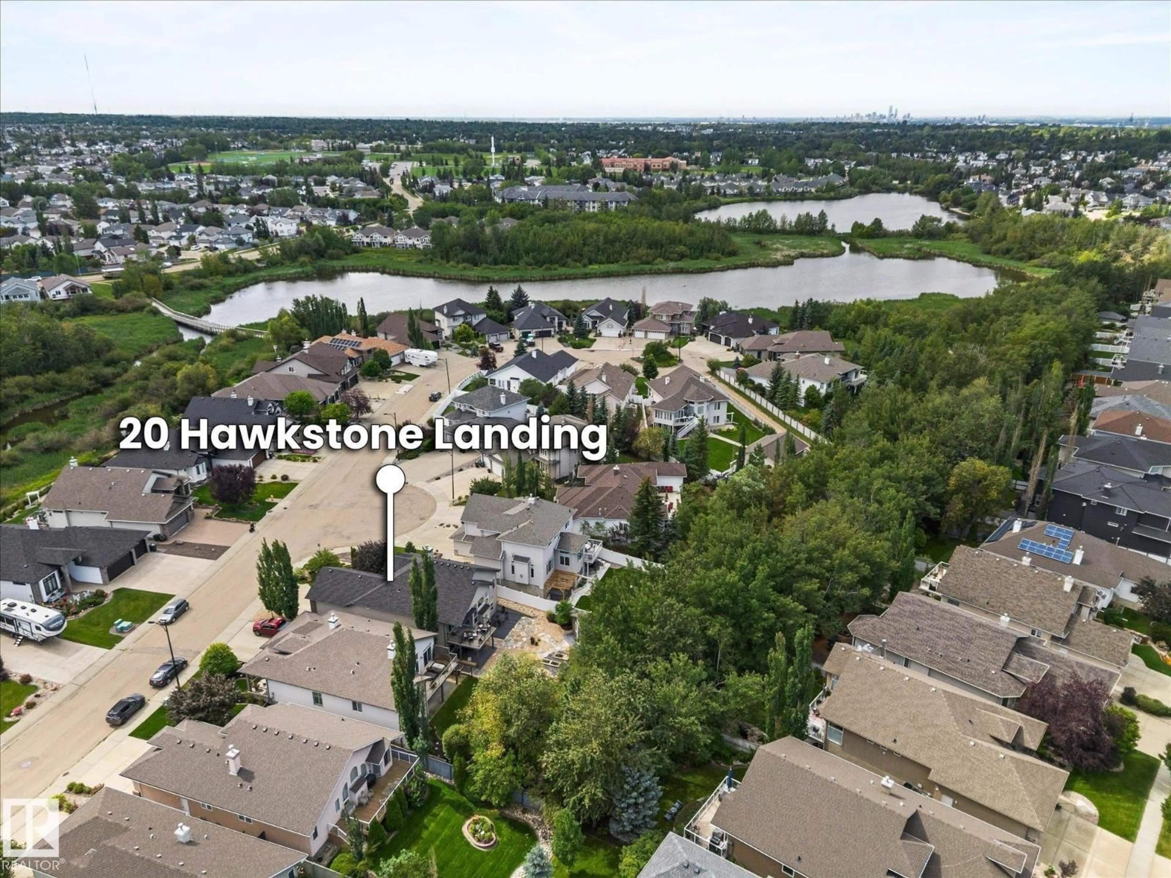 A pic from outside/outdoor area/front of a property/back of a property/a pic from drone, water/lake/river/ocean view for 20 HAWKSTONE LD, Sherwood Park Alberta T8A6M9