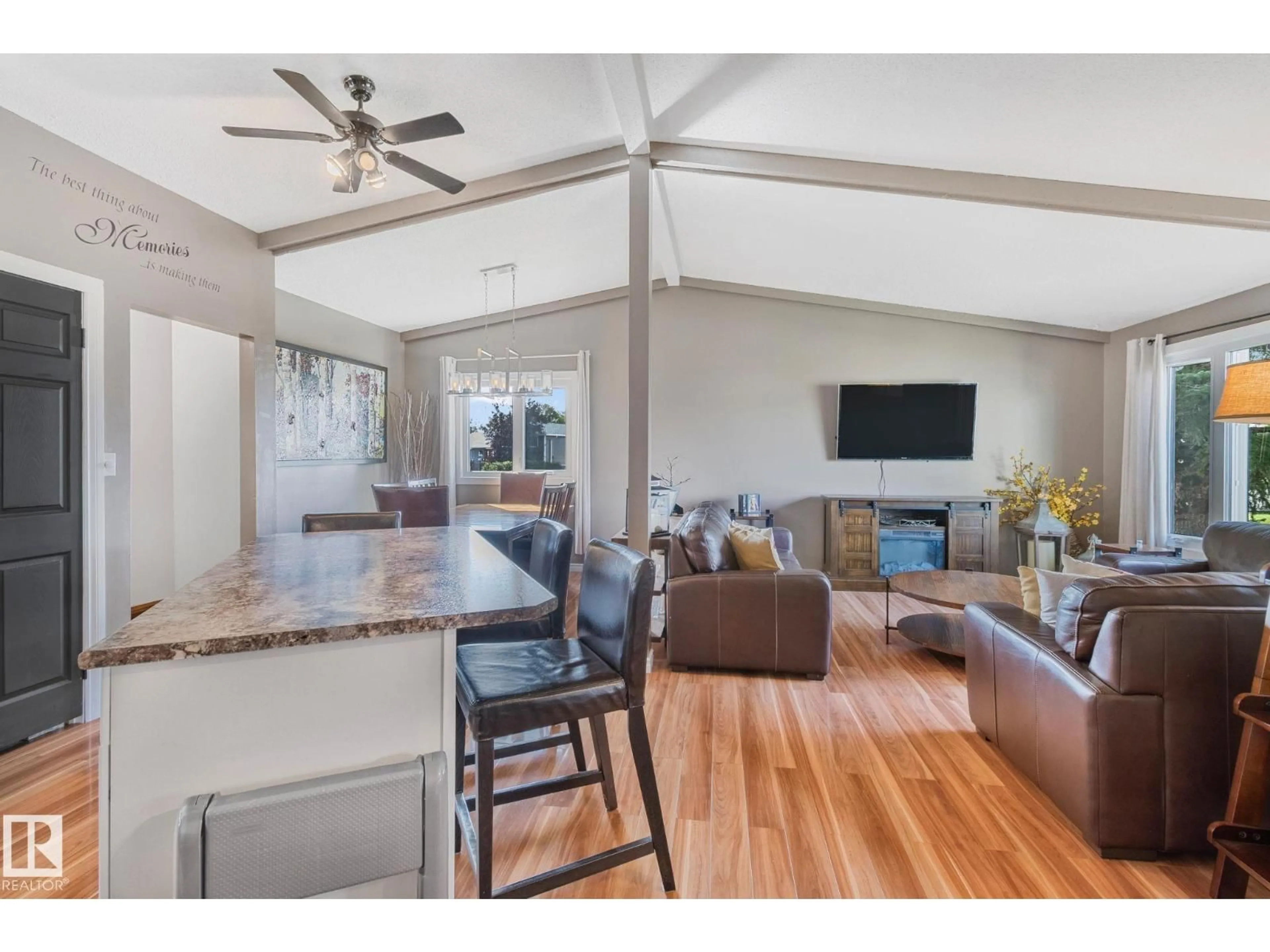 Open concept kitchen, wood/laminate floor for 9501 98A ST, Morinville Alberta T8R1H9