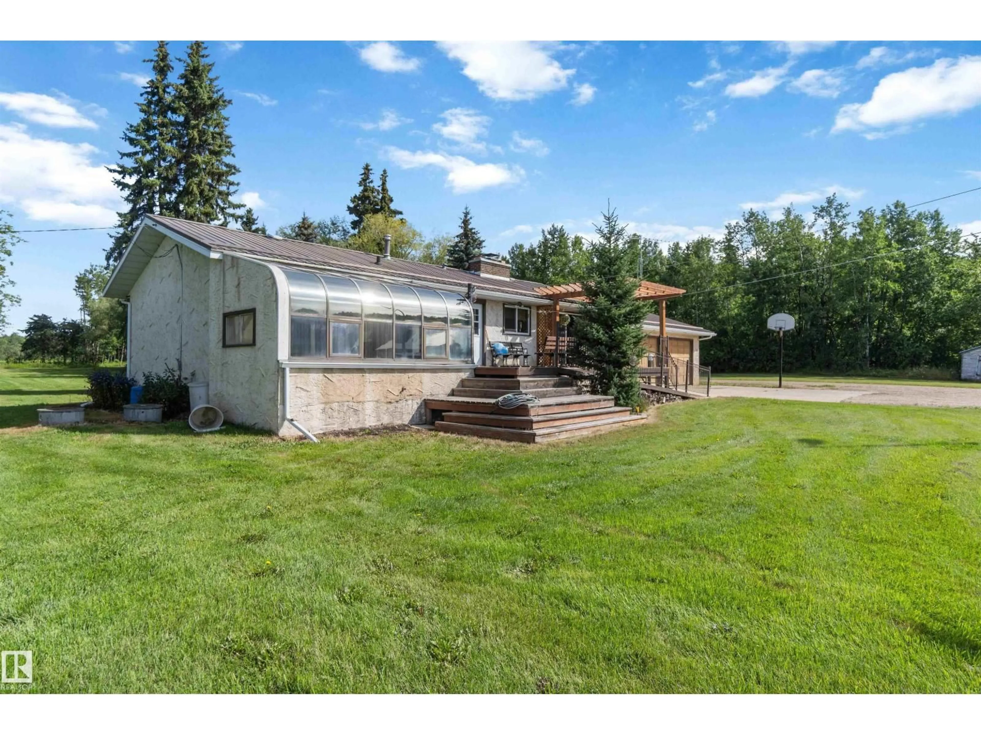 A pic from outside/outdoor area/front of a property/back of a property/a pic from drone, unknown for 23217 TWP RD 594, Rural Thorhild County Alberta T0A3J0