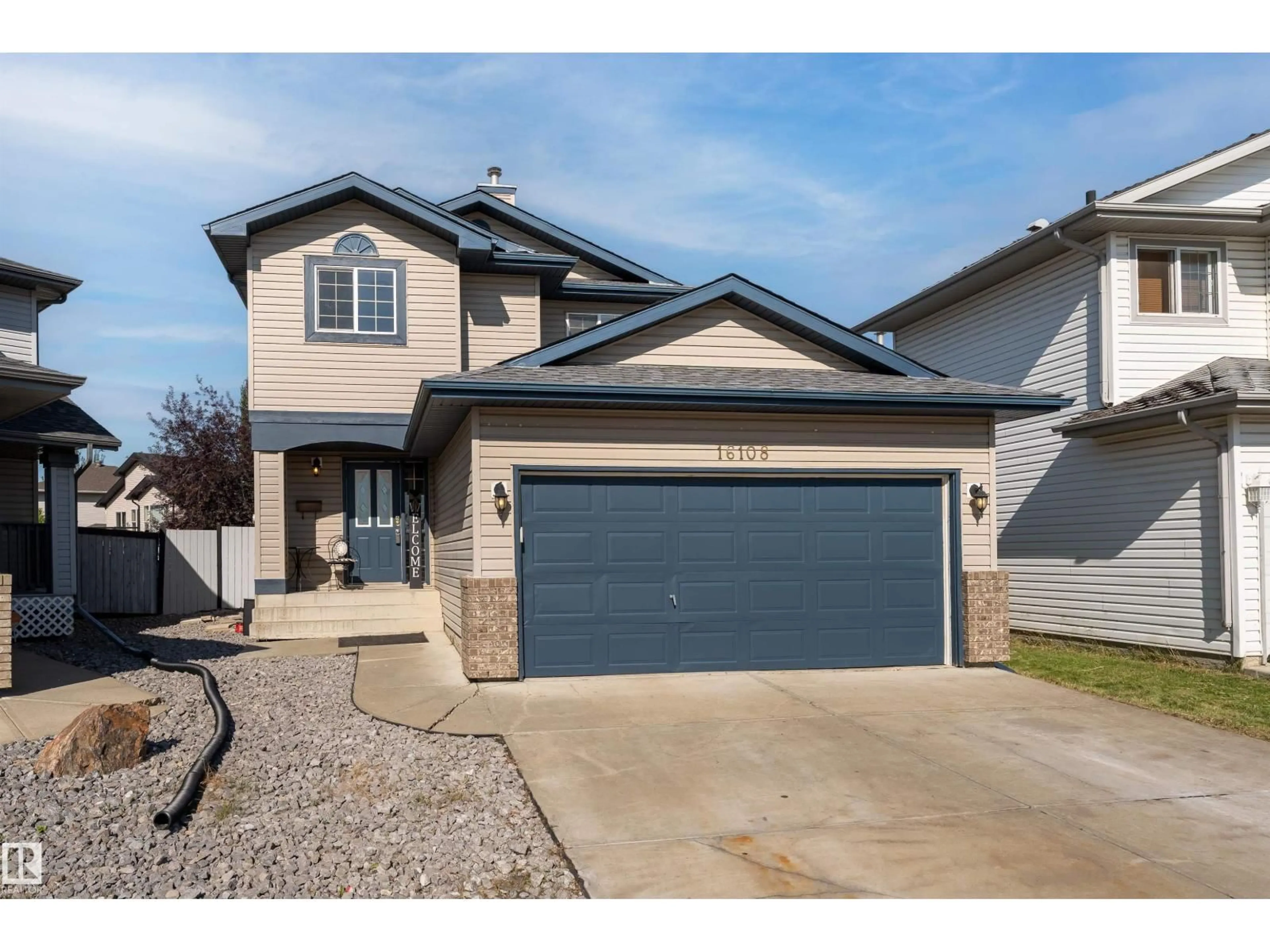 Home with vinyl exterior material, street for 16108 130 ST NW, Edmonton Alberta T6V1S9