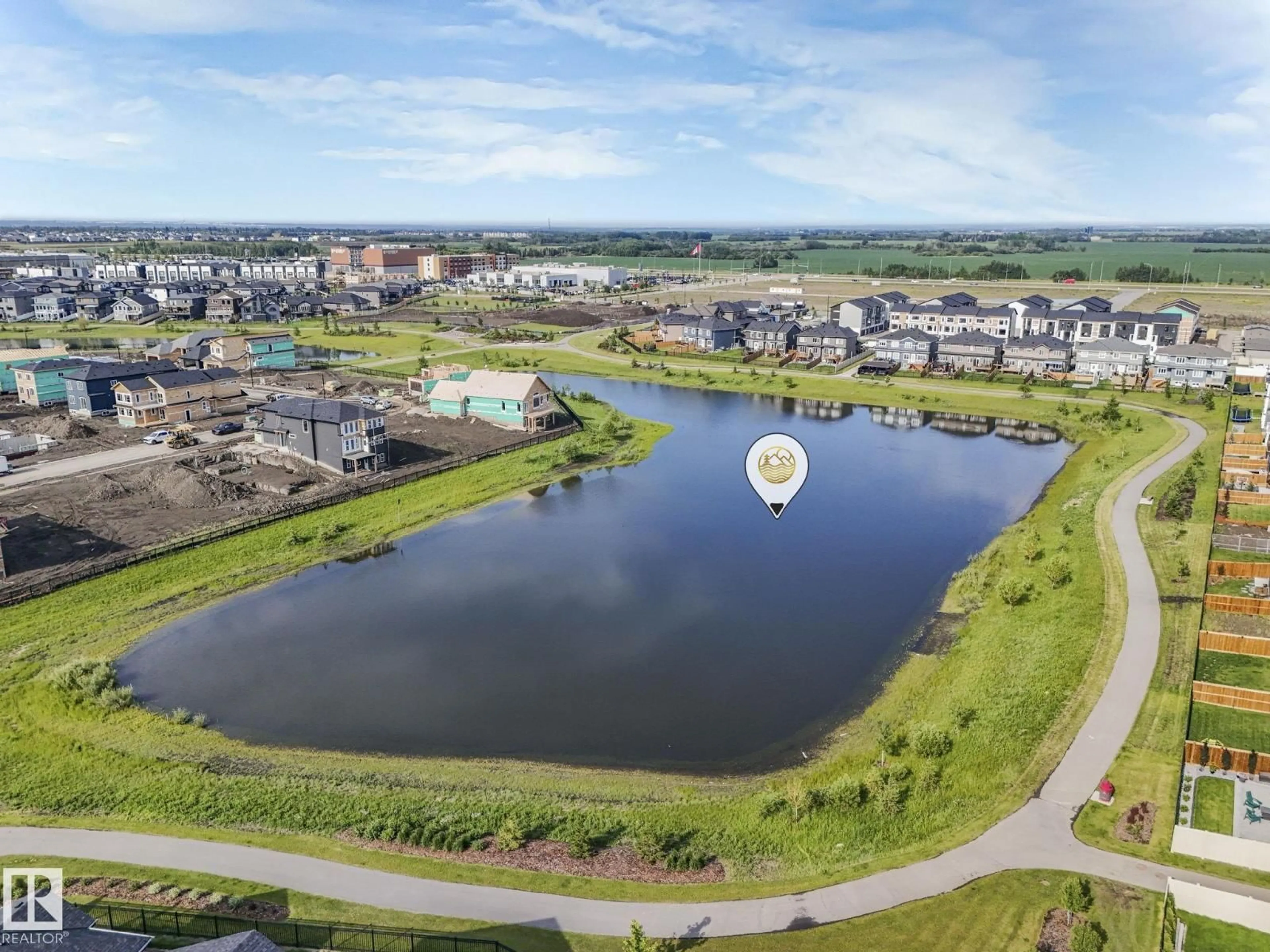 A pic from outside/outdoor area/front of a property/back of a property/a pic from drone, water/lake/river/ocean view for 100 EDGEFIELD WY, St. Albert Alberta T6T1R8