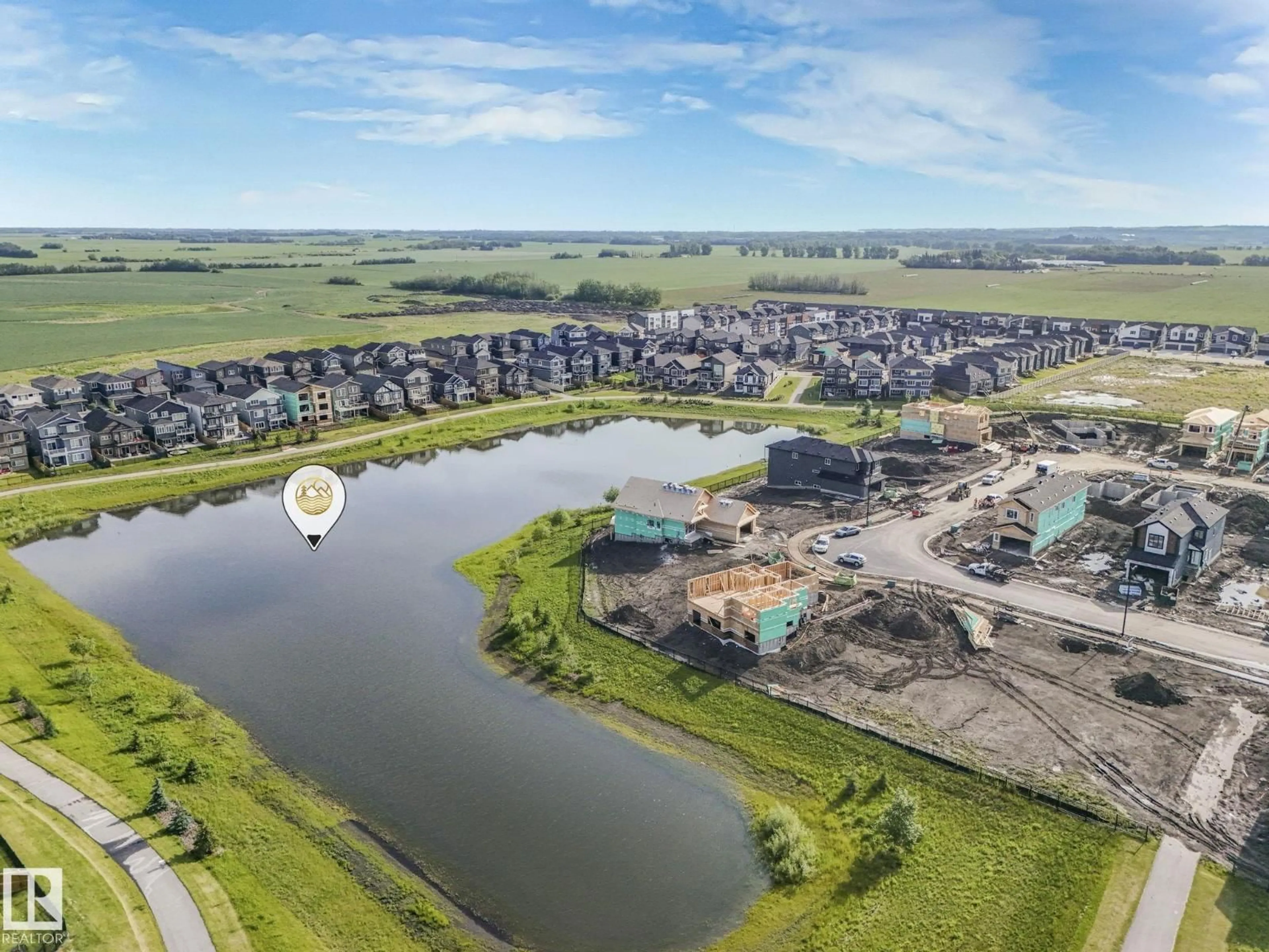 A pic from outside/outdoor area/front of a property/back of a property/a pic from drone, water/lake/river/ocean view for 100 EDGEFIELD WY, St. Albert Alberta T6T1R8