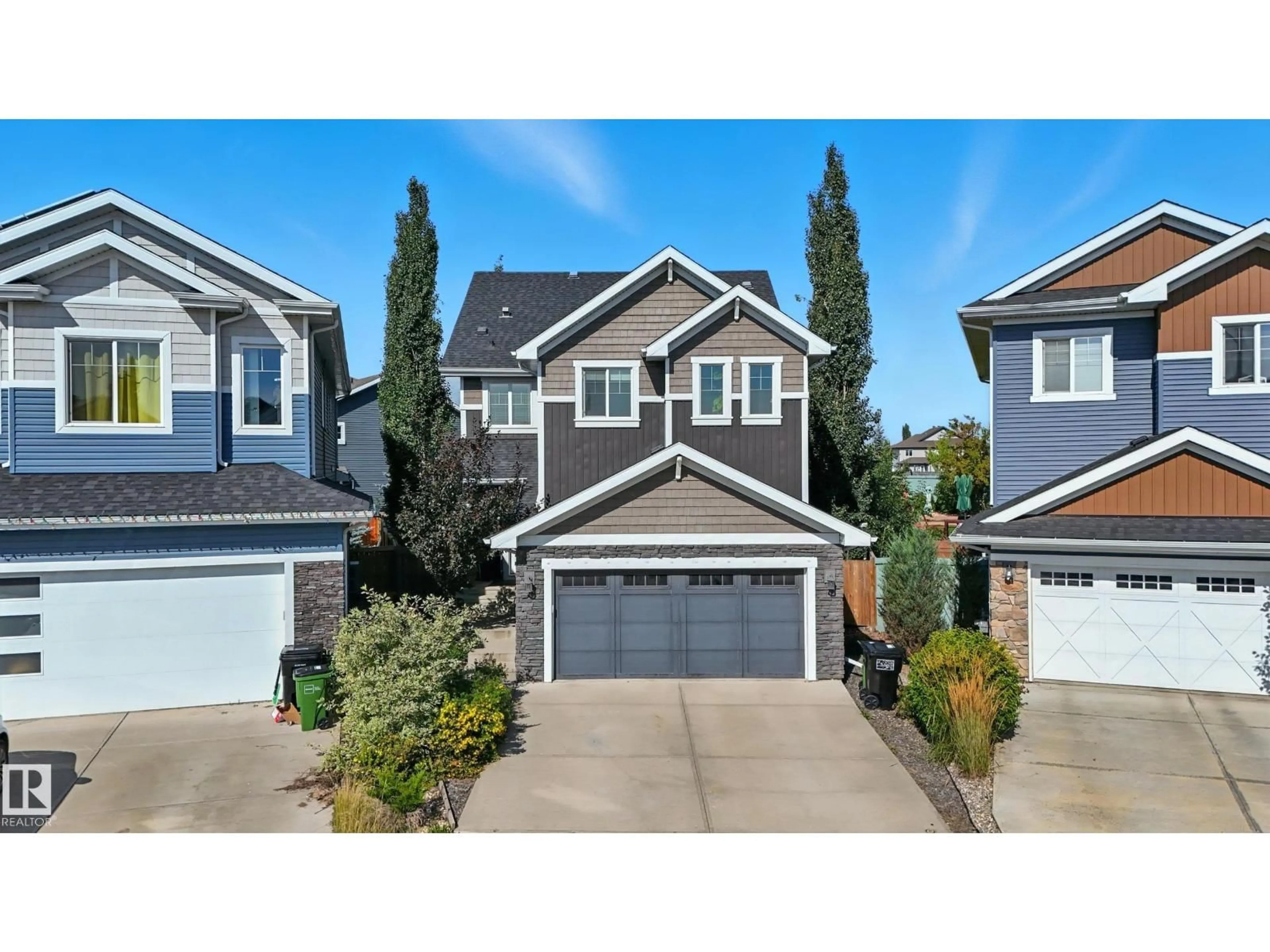 Home with vinyl exterior material, street for 16640 14 AV, Edmonton Alberta T6W3C3