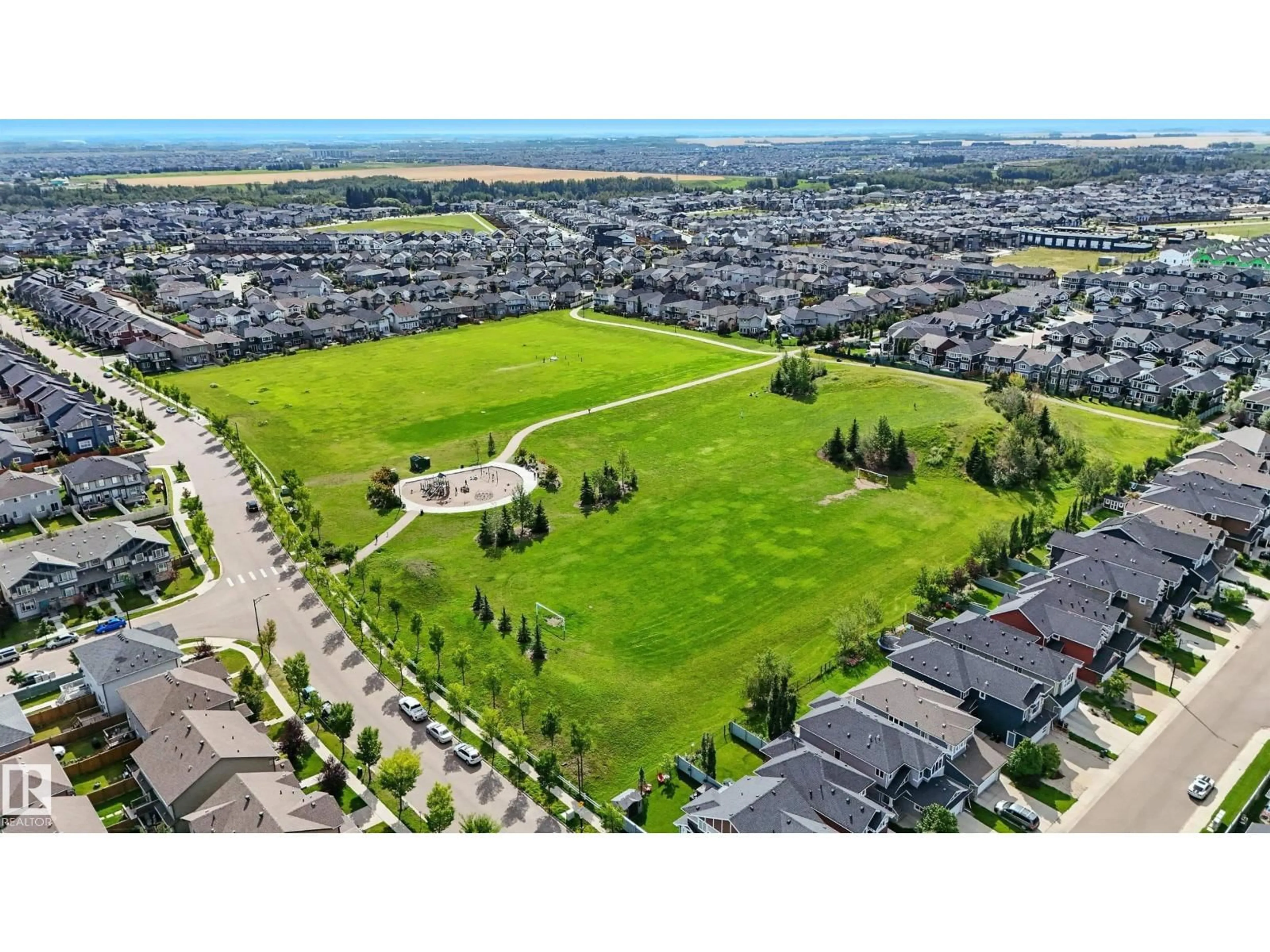 A pic from outside/outdoor area/front of a property/back of a property/a pic from drone, mountain view for 16640 14 AV, Edmonton Alberta T6W3C3