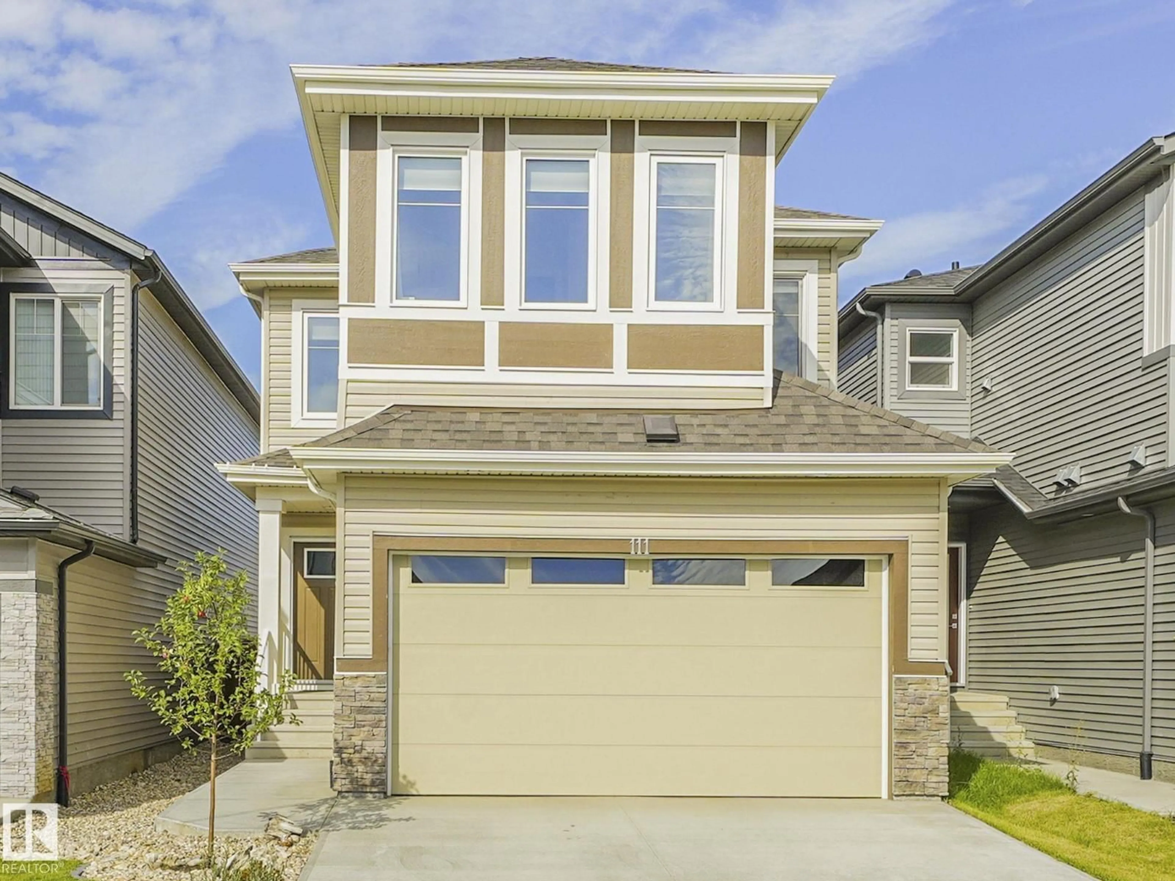 Home with vinyl exterior material, street for 111 BLUFF CV, Leduc Alberta T9E1M8