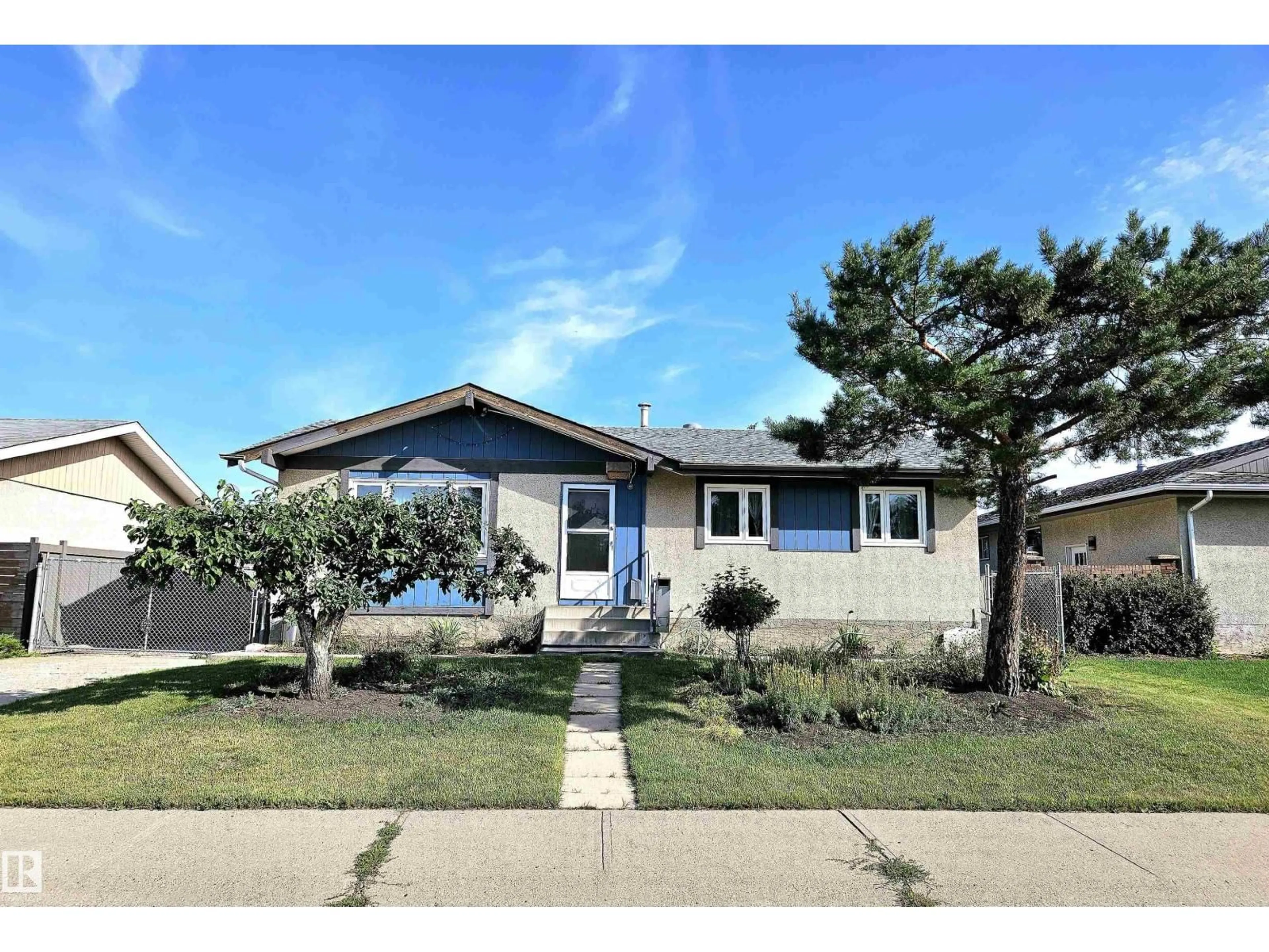 Home with vinyl exterior material, street for NW - 12220 156 AV, Edmonton Alberta T5X2X5