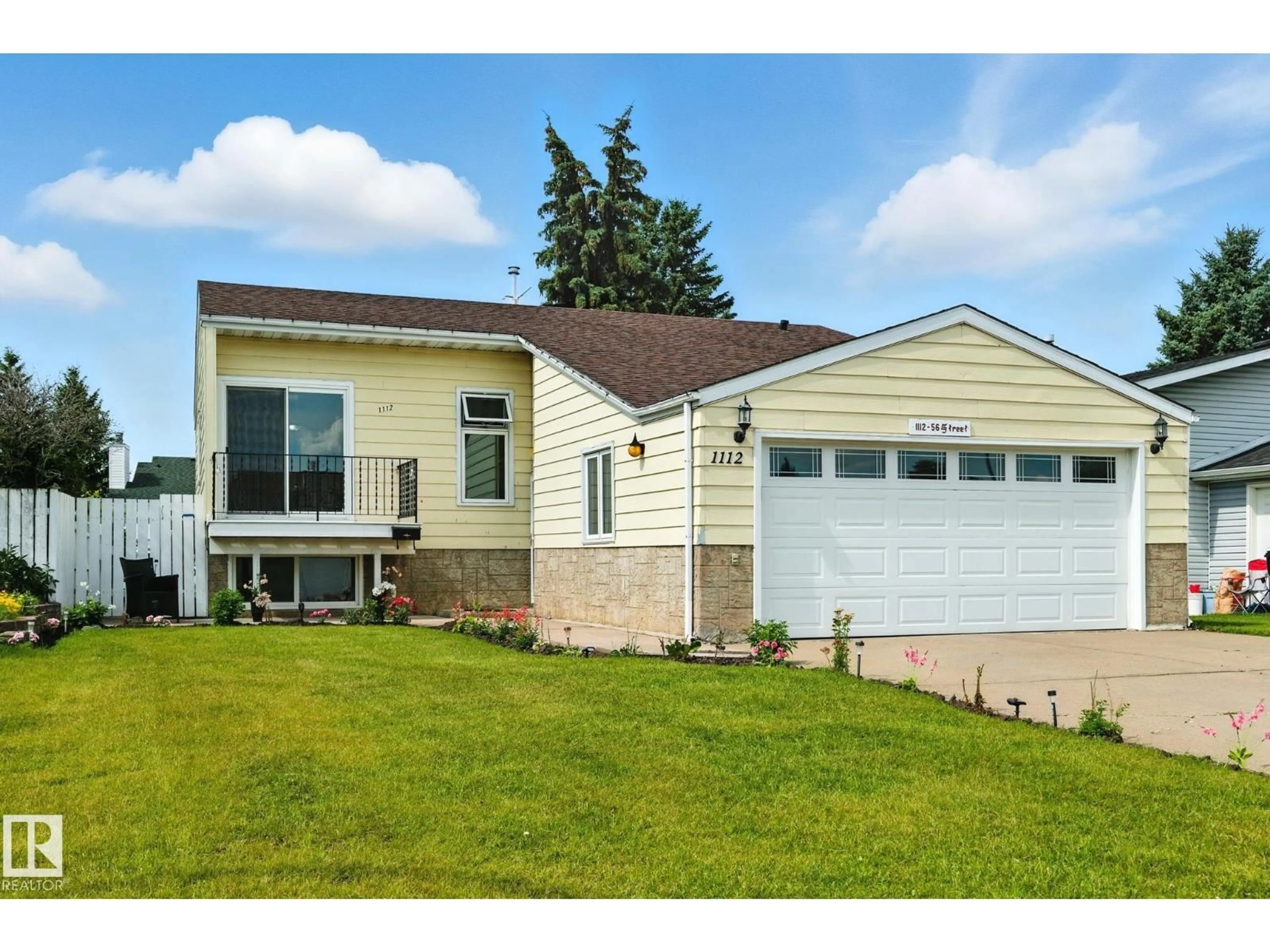 Home with vinyl exterior material, street for 1112 56 ST, Edmonton Alberta T6L1Y3