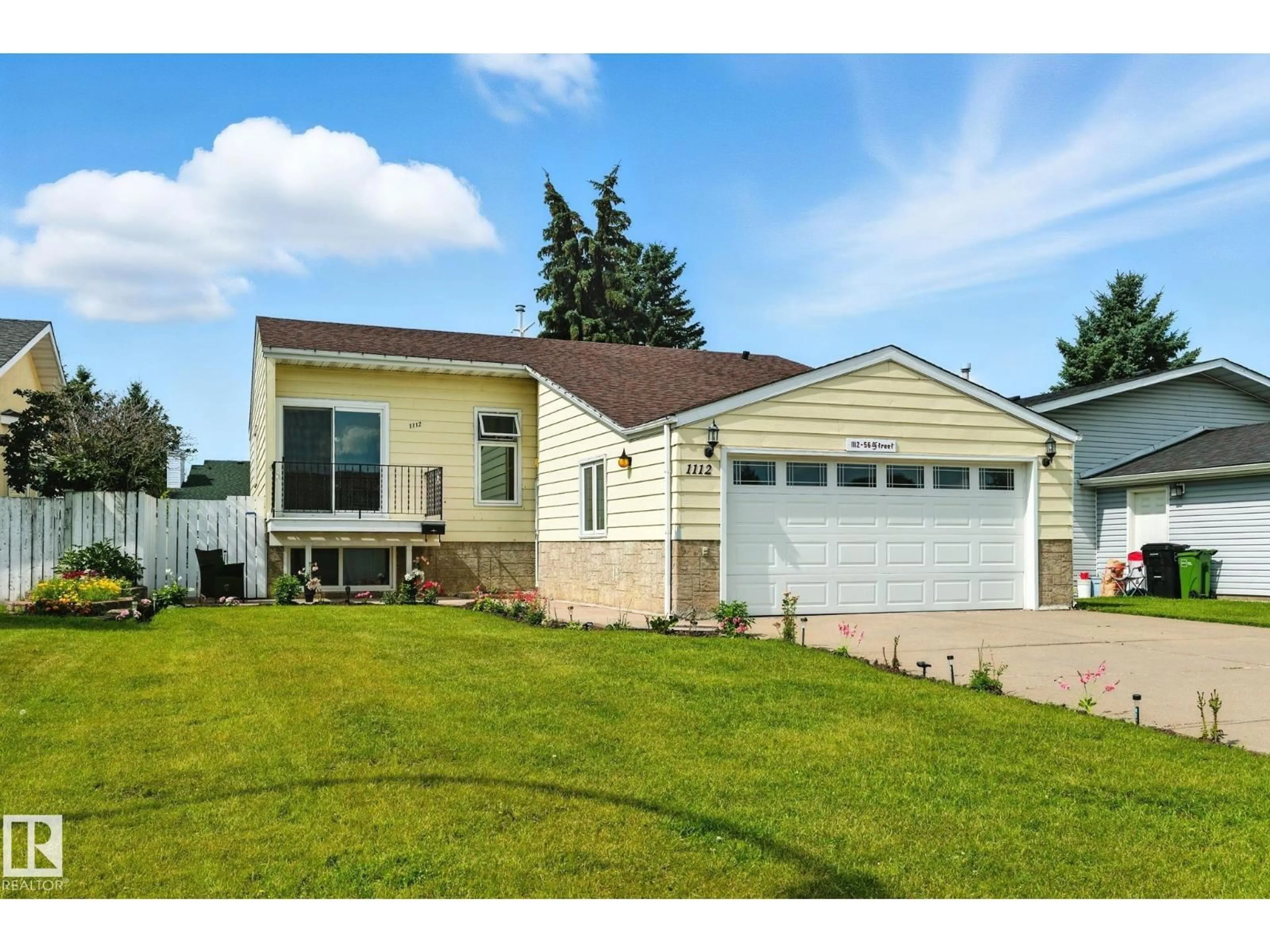 Home with vinyl exterior material, street for 1112 56 ST, Edmonton Alberta T6L1Y3