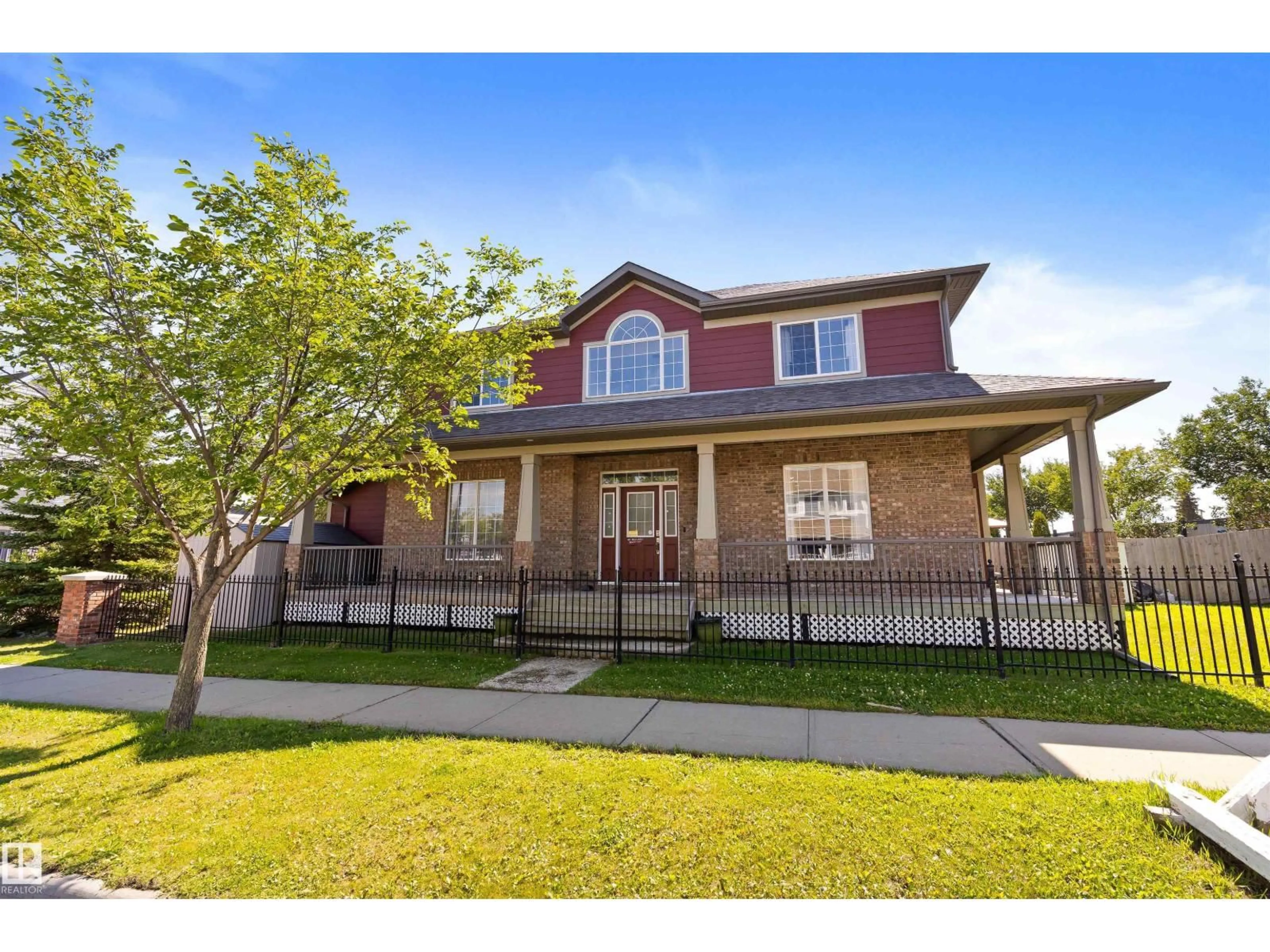 Home with brick exterior material, street for 10416 99 ST, Morinville Alberta T8R0C1