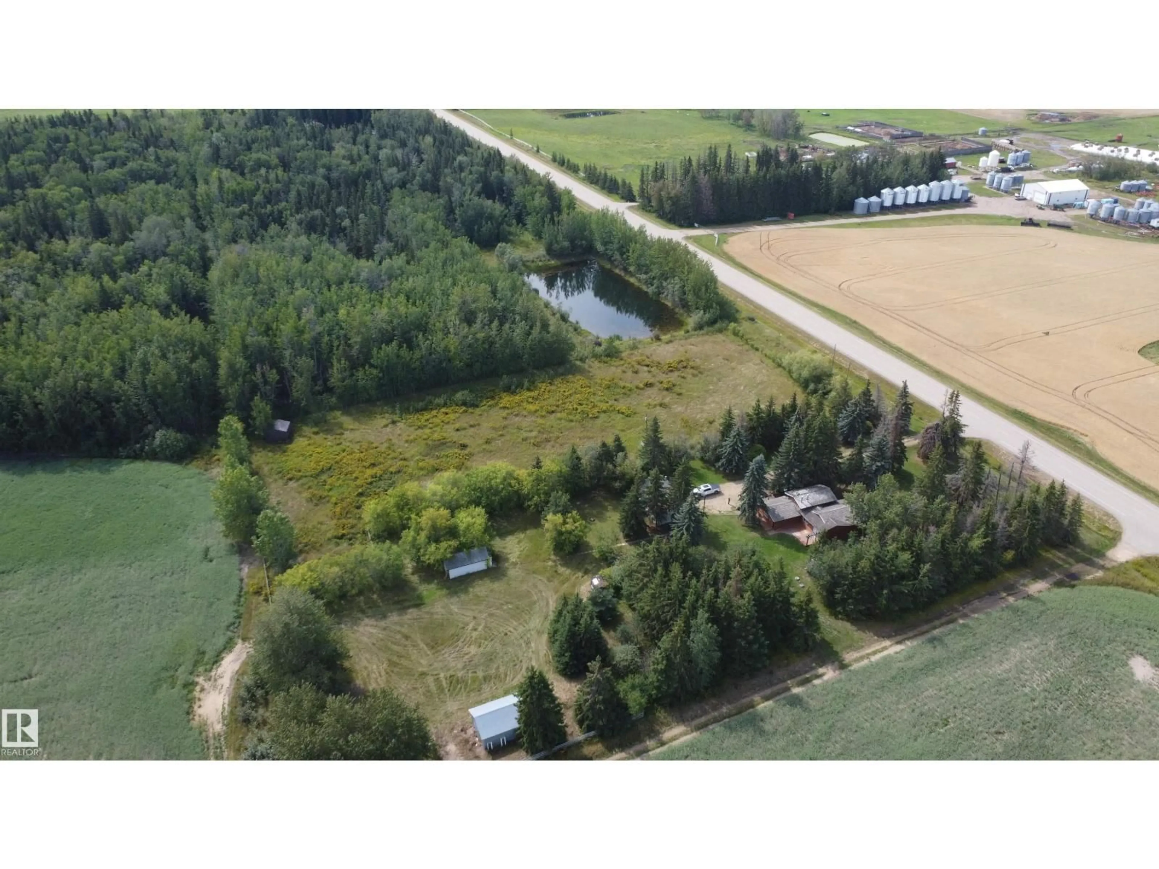 A pic from outside/outdoor area/front of a property/back of a property/a pic from drone, forest/trees view for 62309 HWY 801, Rural Westlock County Alberta T0G0S0