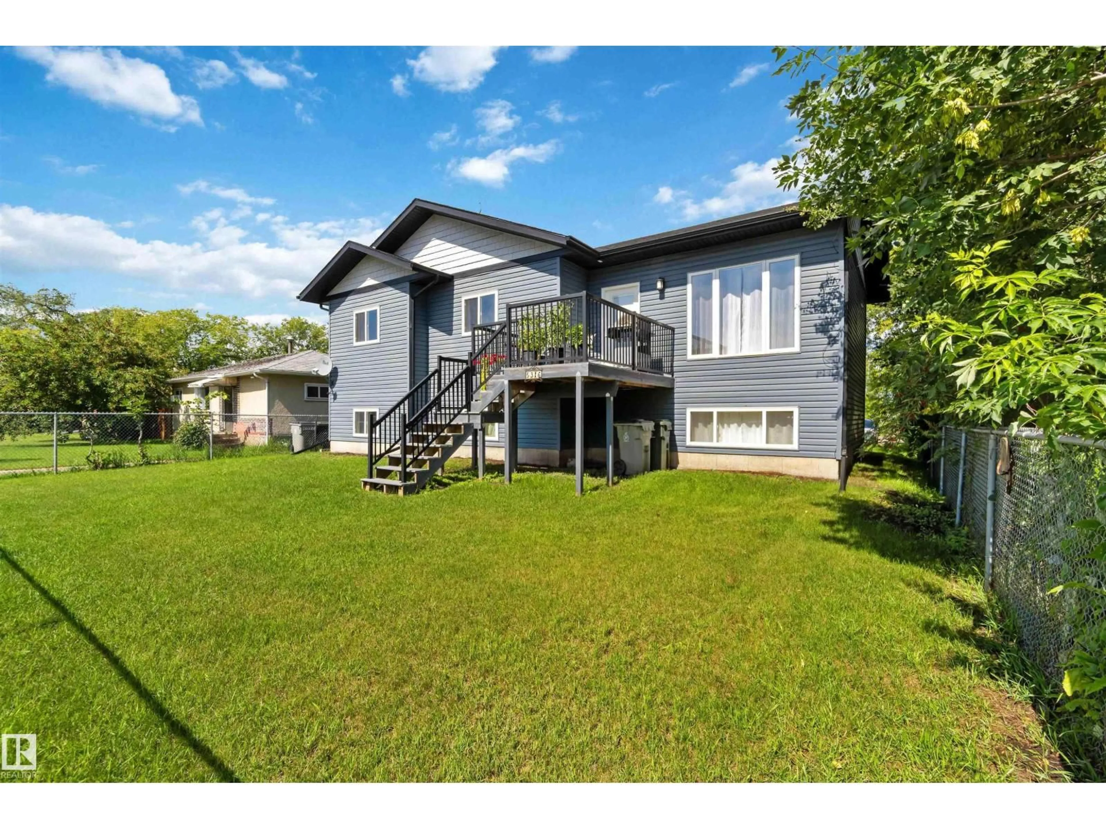 A pic from outside/outdoor area/front of a property/back of a property/a pic from drone, water/lake/river/ocean view for 5316 48 AV, Redwater Alberta T0A2W0
