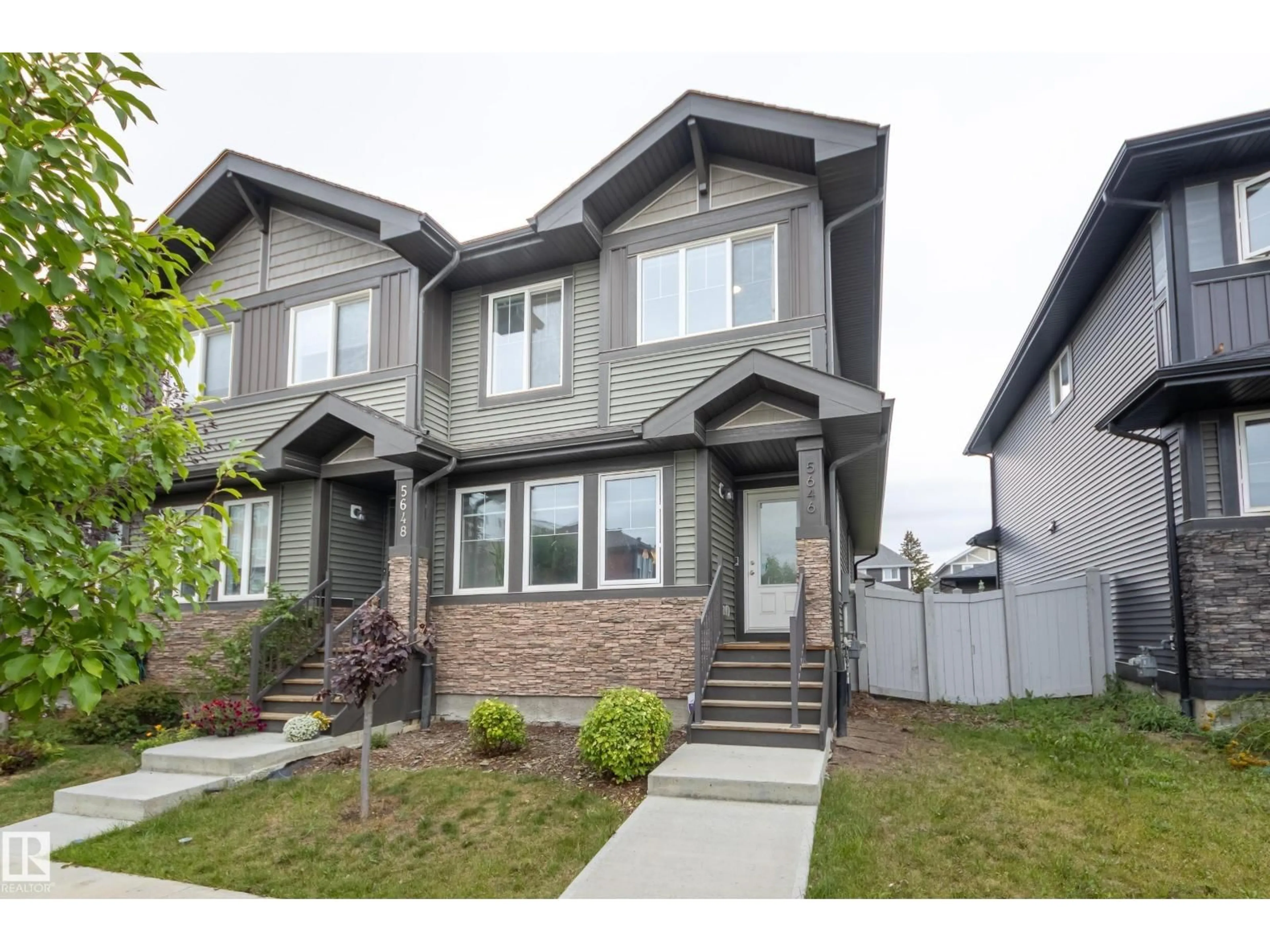 Home with vinyl exterior material, street for 5646 JUCHLI AV, Edmonton Alberta T5E6X5
