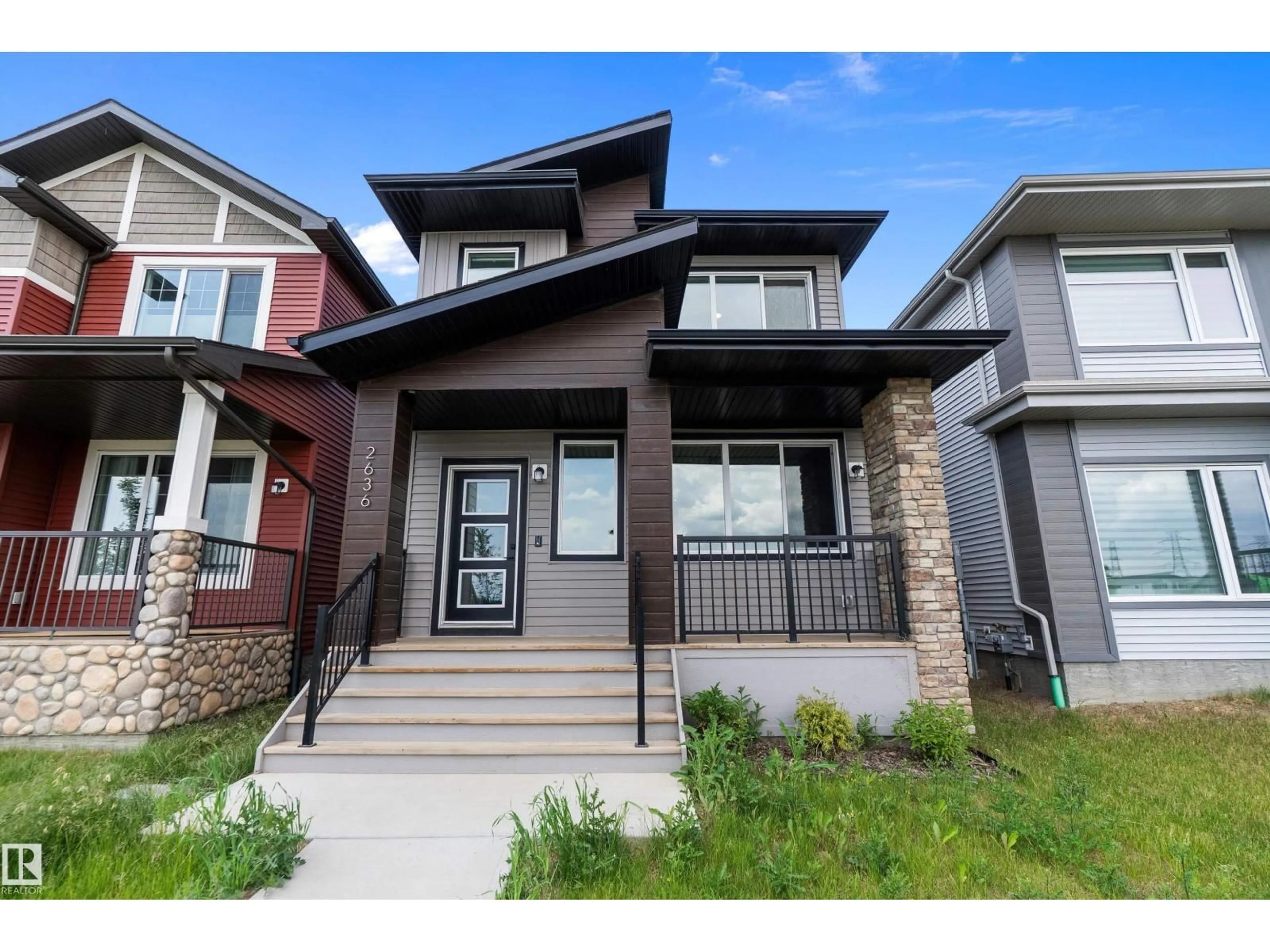 Home with vinyl exterior material, street for NW - 2636 192 ST, Edmonton Alberta T6M1L1