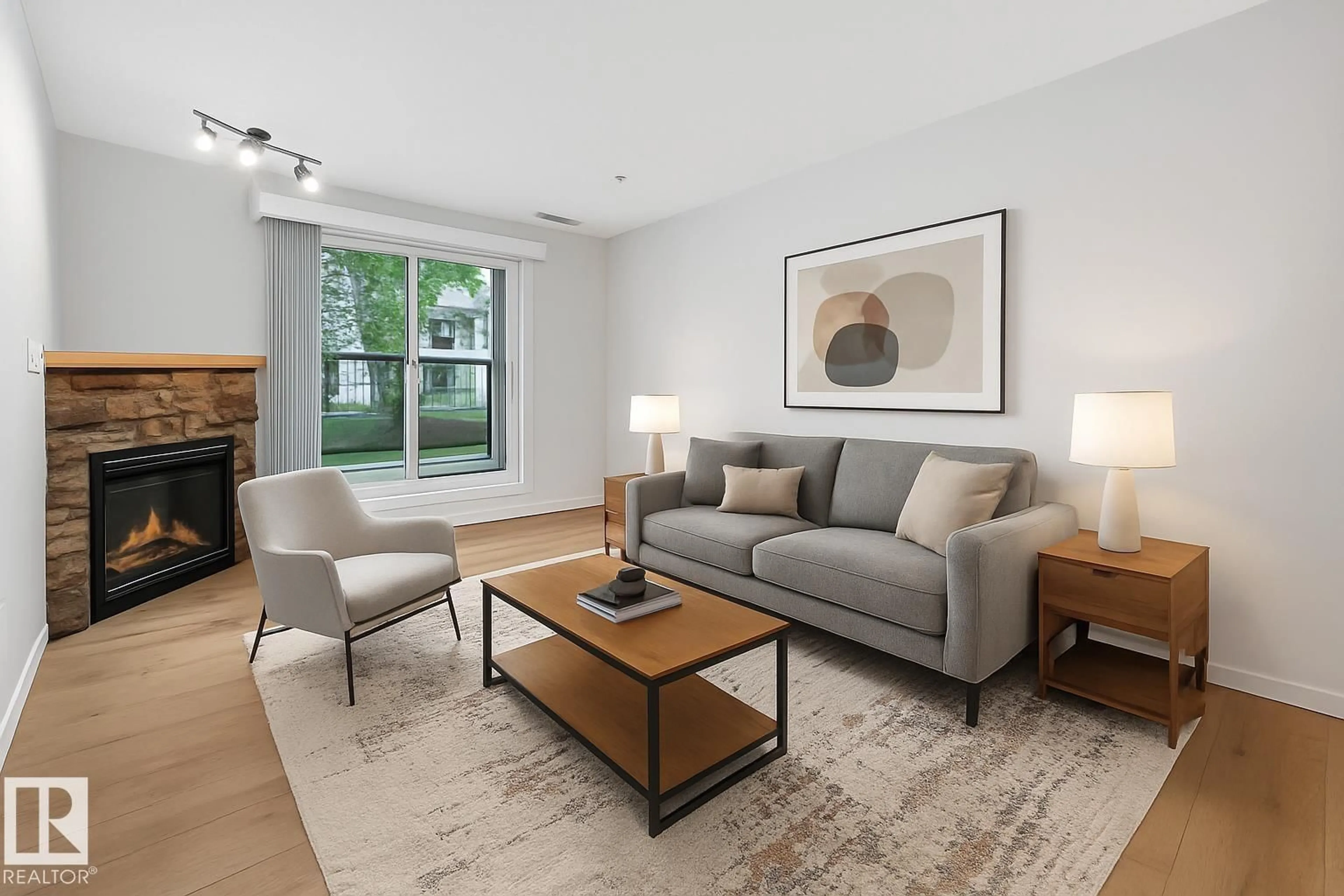 Living room with furniture, unknown for #105 - 279 SUDER GREENS DR, Edmonton Alberta T5T6X6