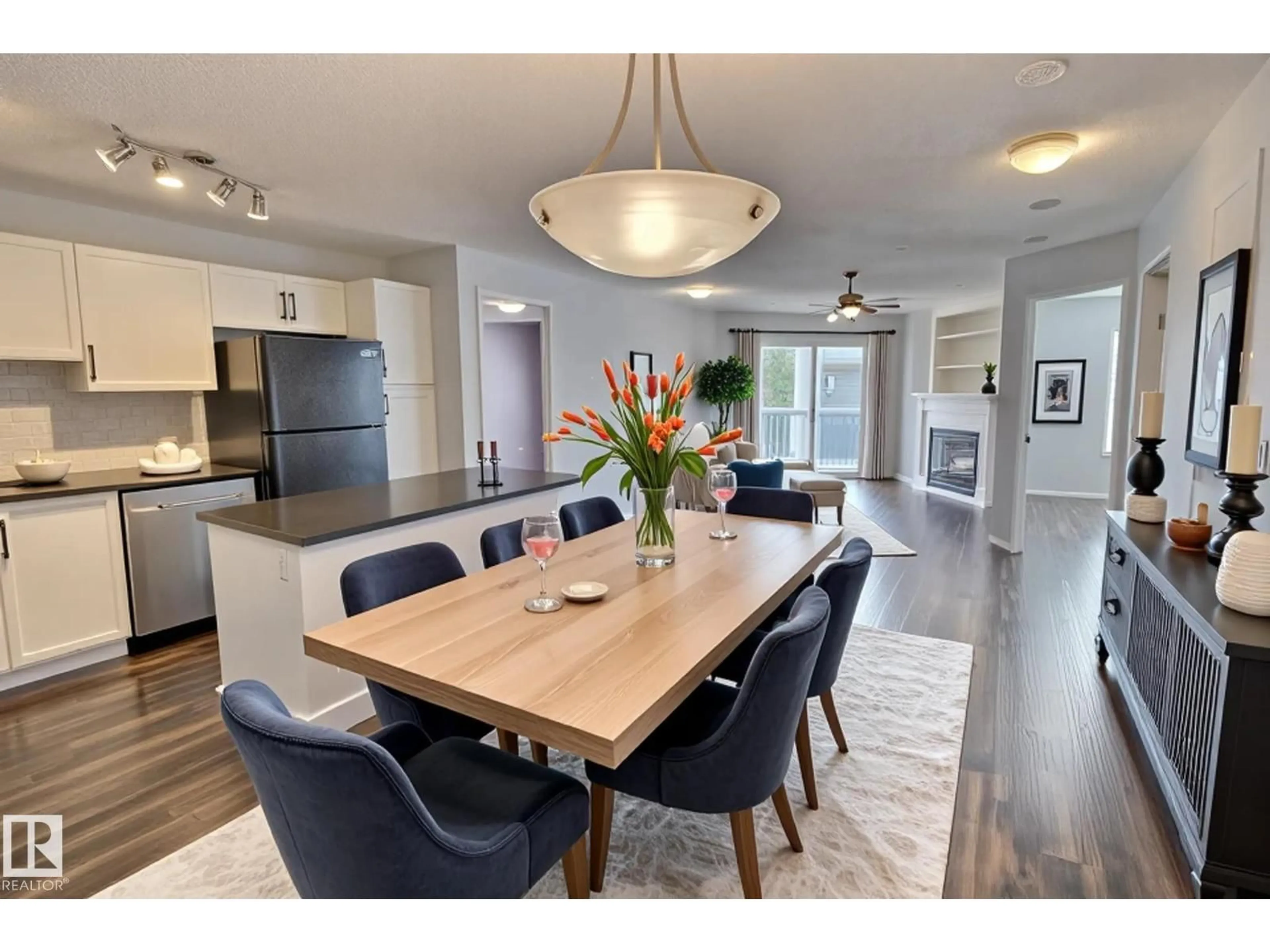 Open concept kitchen, wood/laminate floor for 228 16035 132 ST NW, Edmonton Alberta T6V0B4