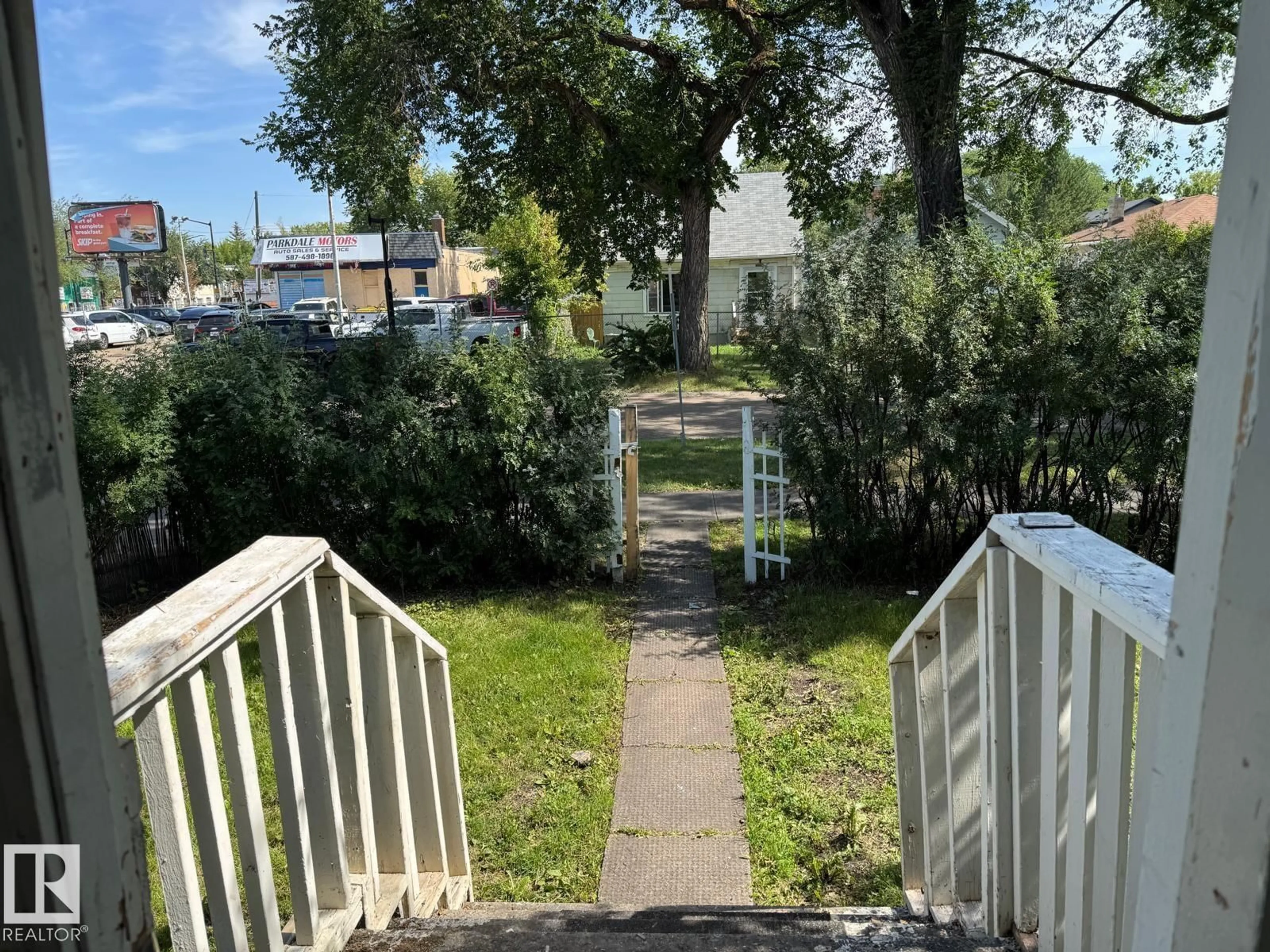A pic from outside/outdoor area/front of a property/back of a property/a pic from drone, street for NW - 11734 87 ST, Edmonton Alberta T5B3M7