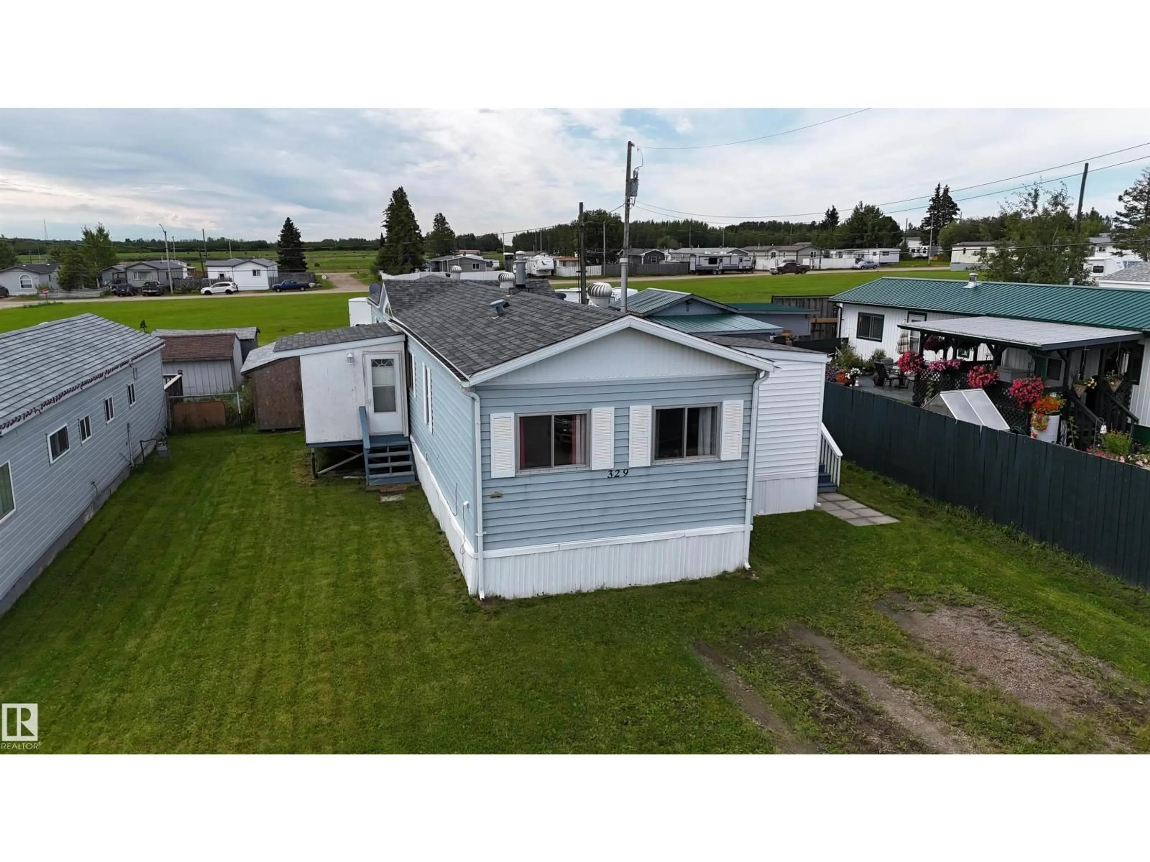 A pic from outside/outdoor area/front of a property/back of a property/a pic from drone, unknown for 49301 - 329 RR 80, Rural Brazeau County Alberta T7A1L7