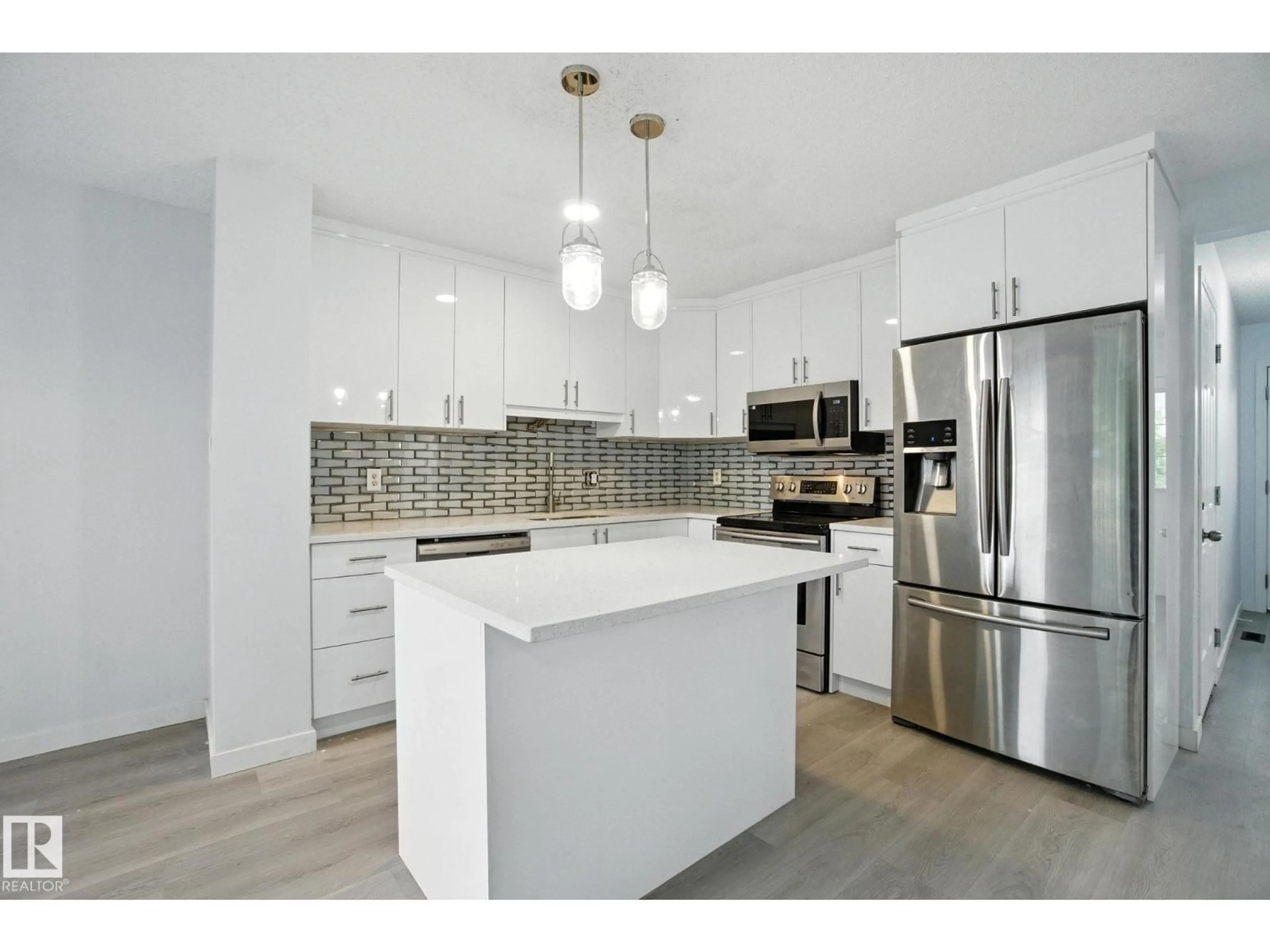 Open concept kitchen, unknown for 7931 7 AV SW, Edmonton Alberta T6X1N3