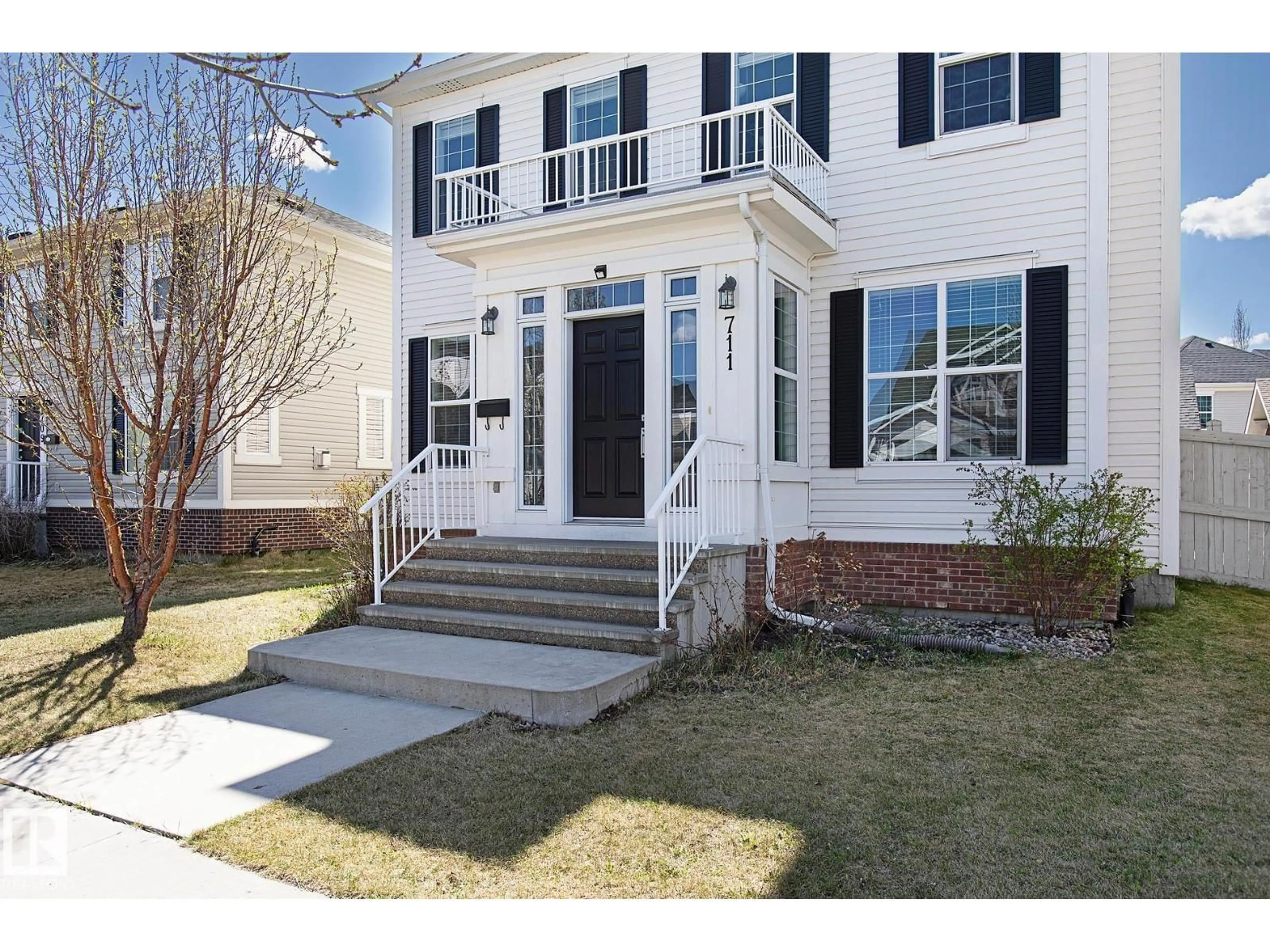 Home with vinyl exterior material, street for 711 DECOTEAU WY, Edmonton Alberta T5E6P3