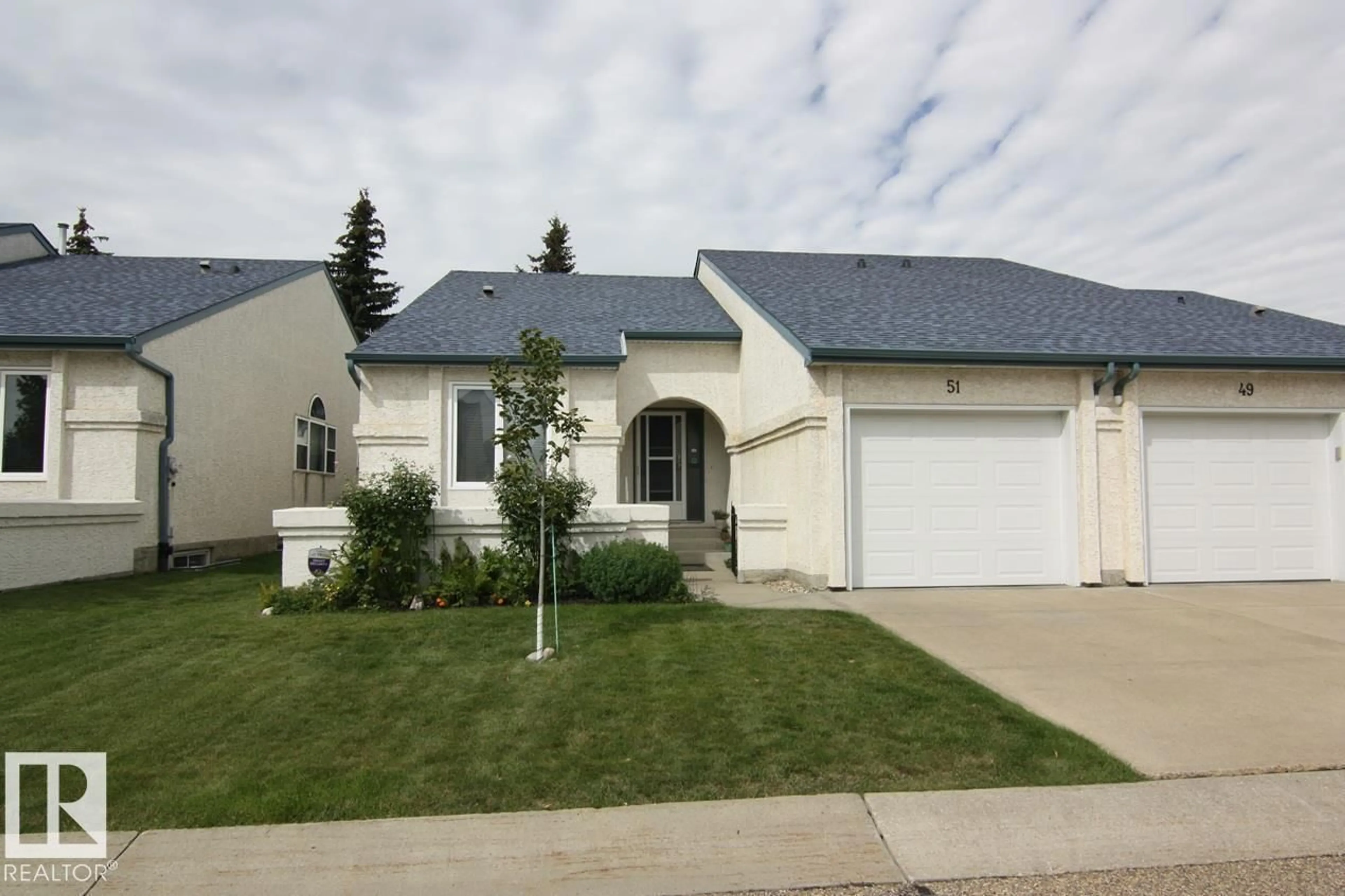 Home with vinyl exterior material, street for 51 - 9718 176 ST NW, Edmonton Alberta T5T6B8