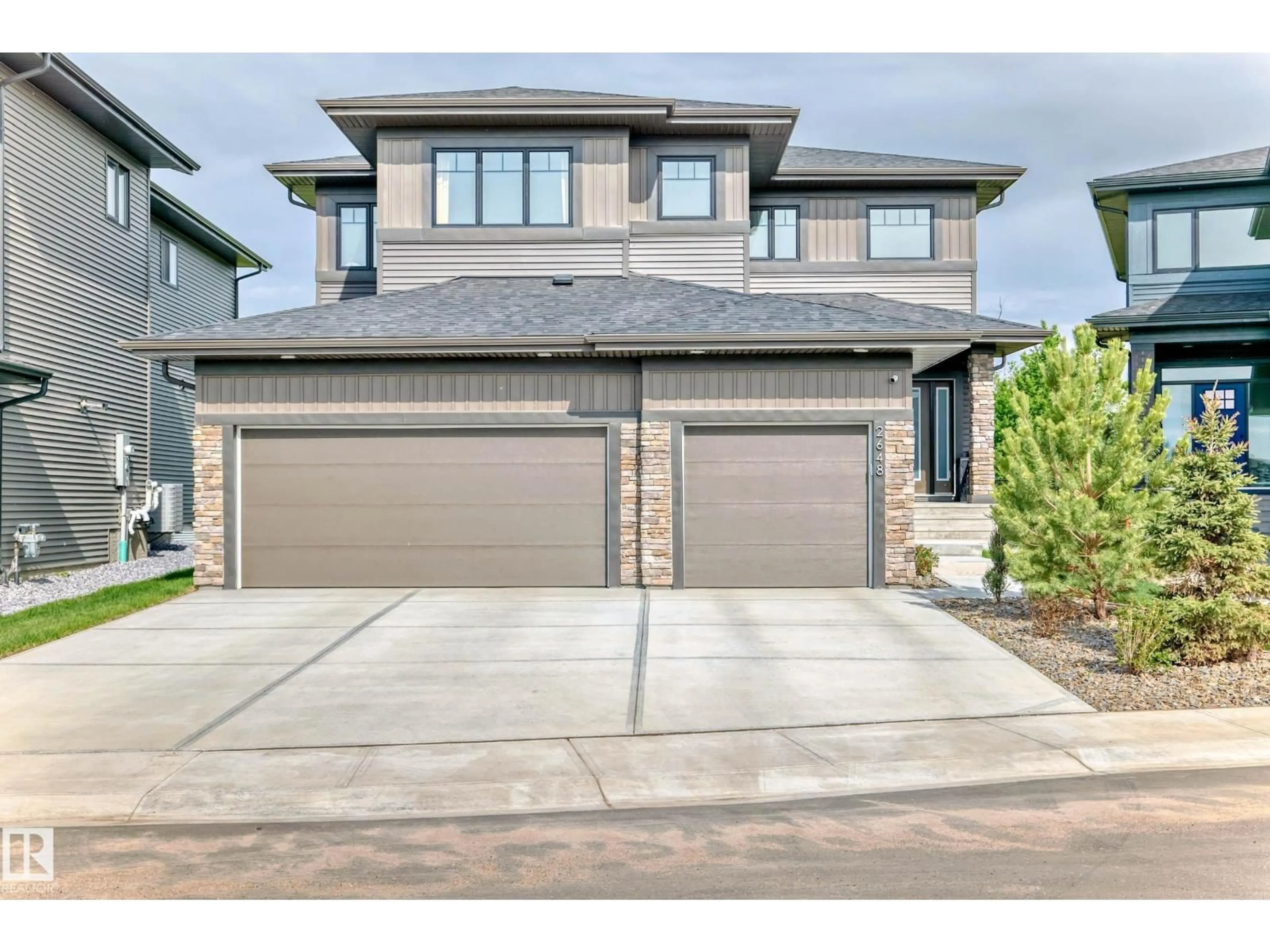 Home with brick exterior material, street for NW - 2648 208 ST, Edmonton Alberta T6M1P3
