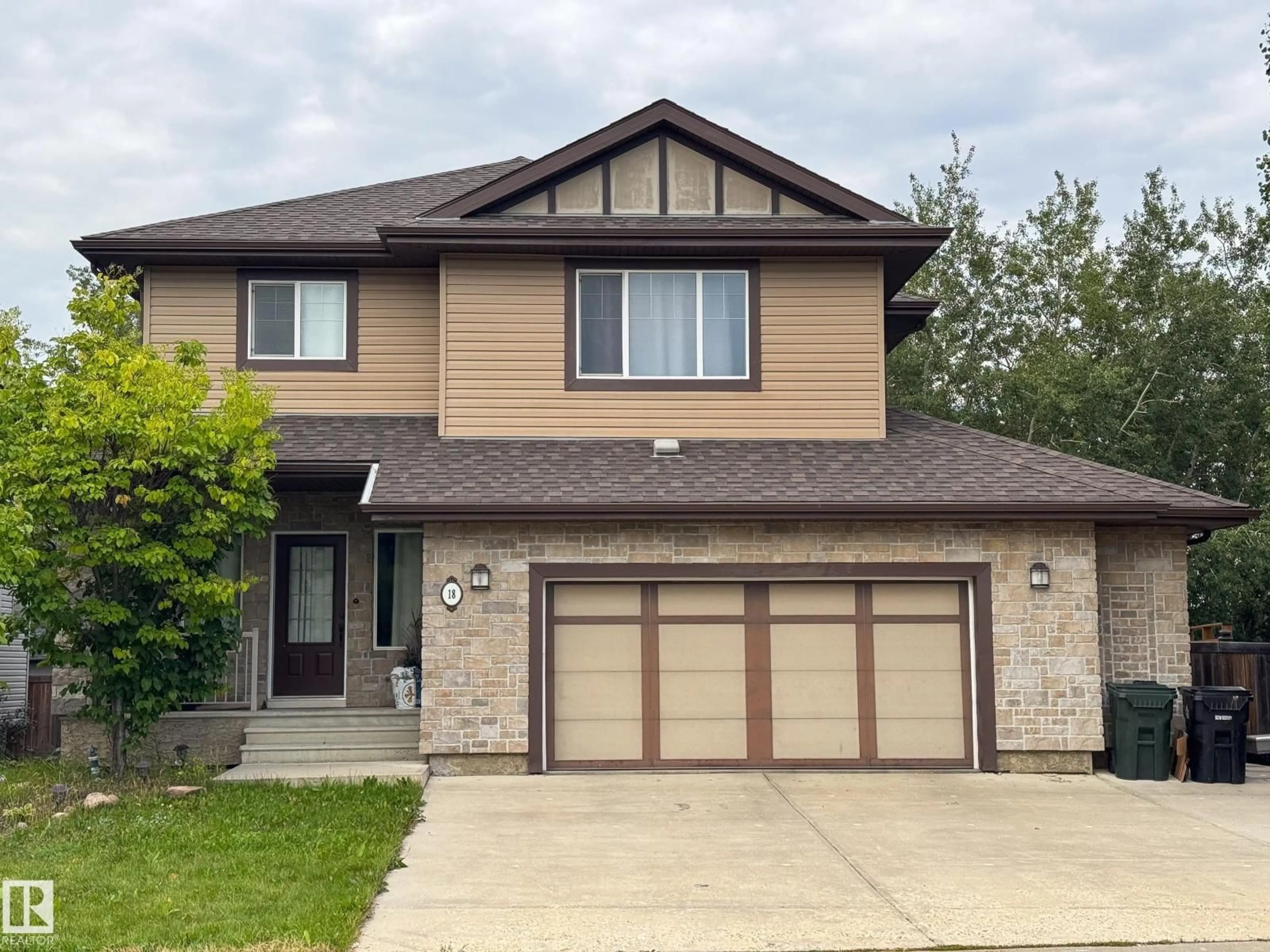 Home with vinyl exterior material, street for 18 VALARIE BA, Spruce Grove Alberta T7X0J7