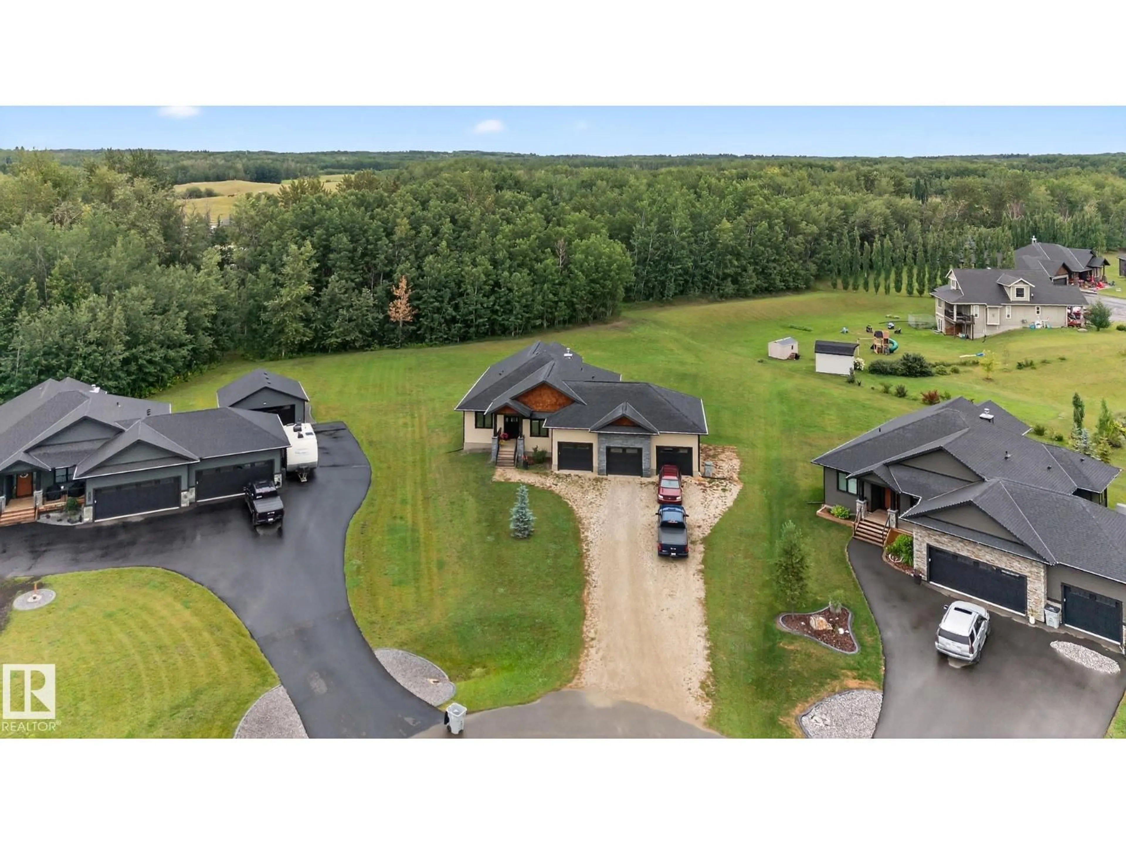 A pic from outside/outdoor area/front of a property/back of a property/a pic from drone, unknown for 2027 JUNIPER LN, Rural Parkland County Alberta T7Z0G8