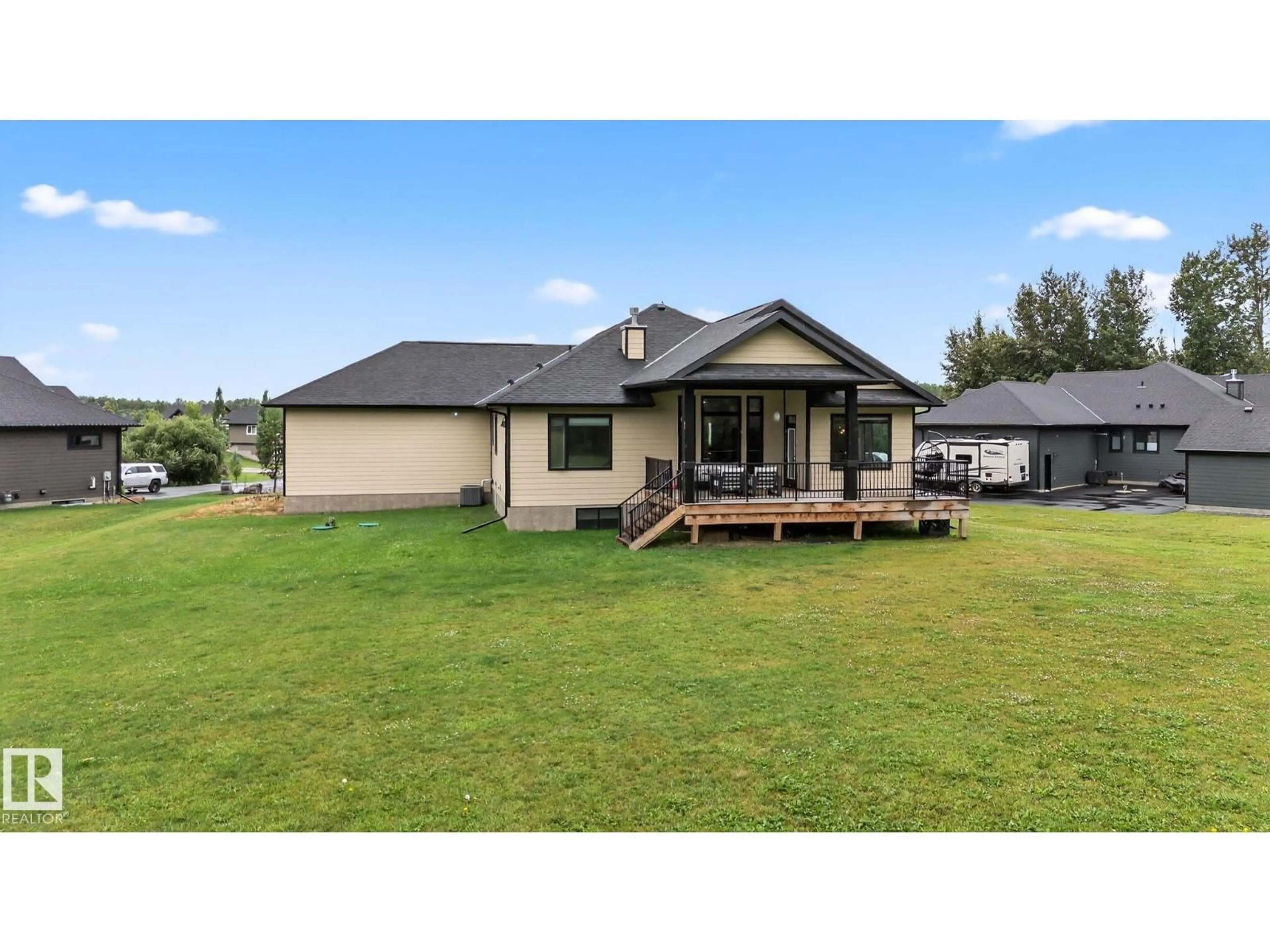 A pic from outside/outdoor area/front of a property/back of a property/a pic from drone, water/lake/river/ocean view for 2027 JUNIPER LN, Rural Parkland County Alberta T7Z0G8