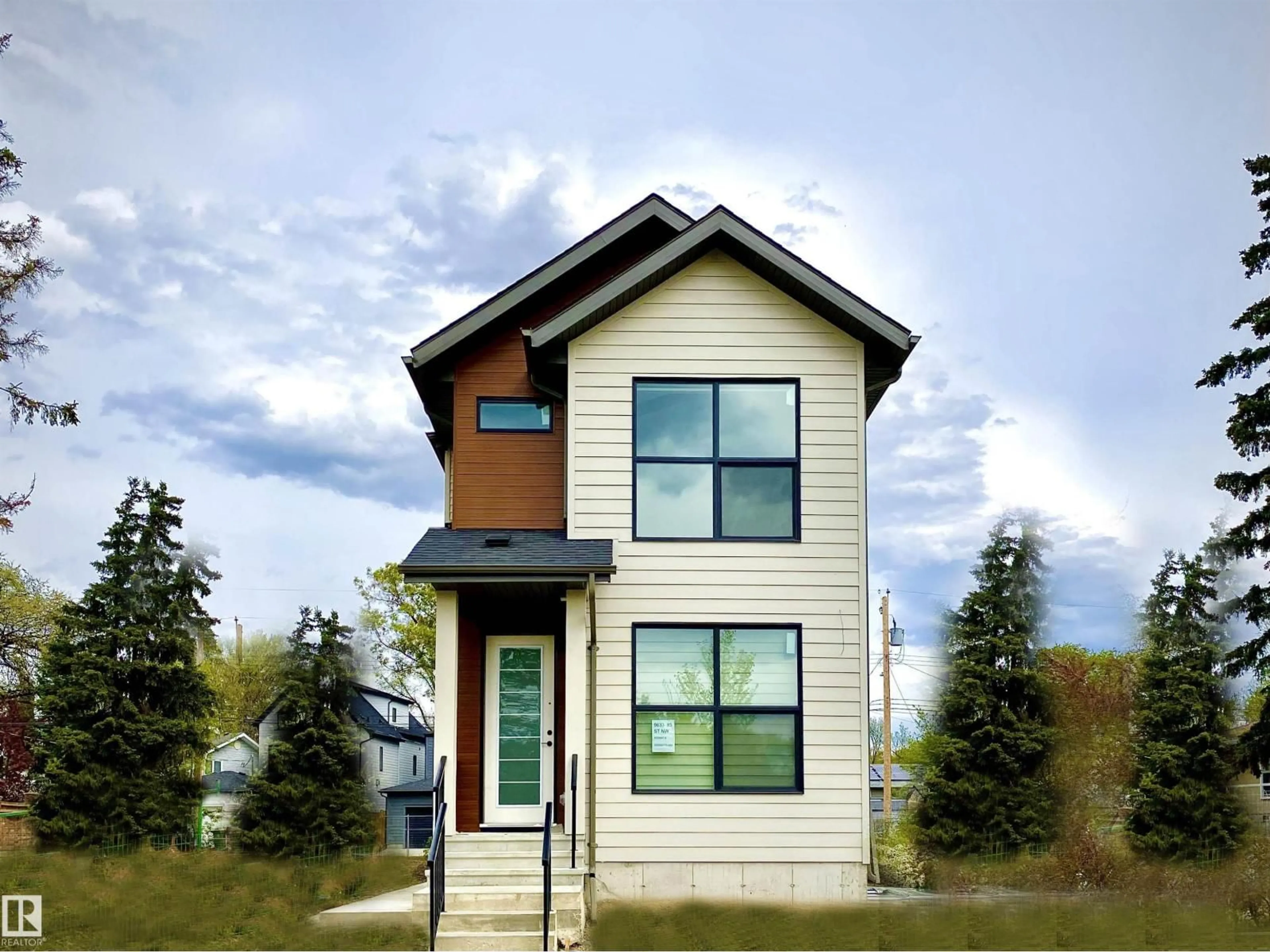 Home with vinyl exterior material, street for NW - 9633 85 ST, Edmonton Alberta T6C3E3