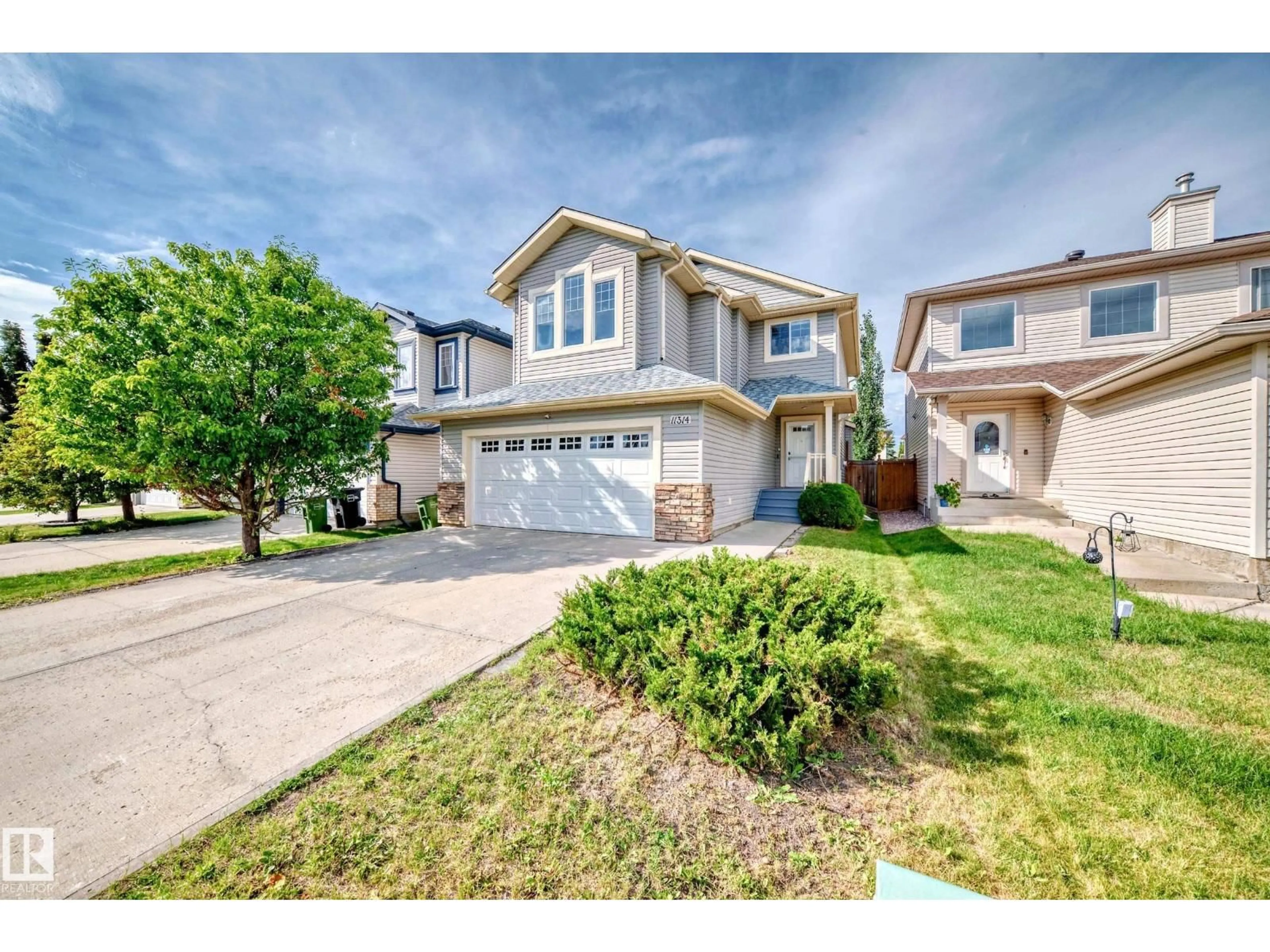 Home with vinyl exterior material, street for 11314 167A AV, Edmonton Alberta T5X0A7