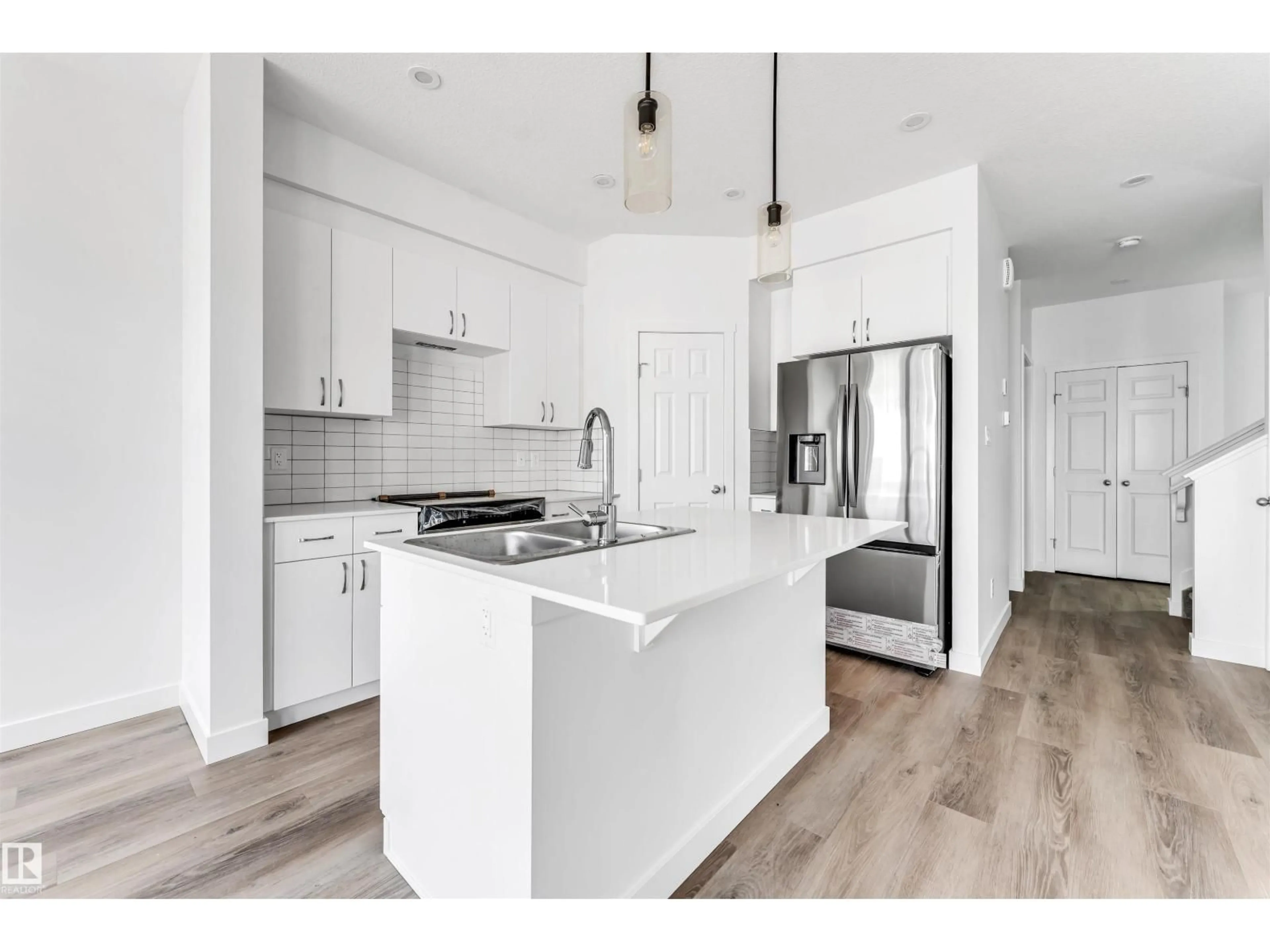 Open concept kitchen, unknown for 1216 13 AVE NW, Edmonton Alberta T6T2W2