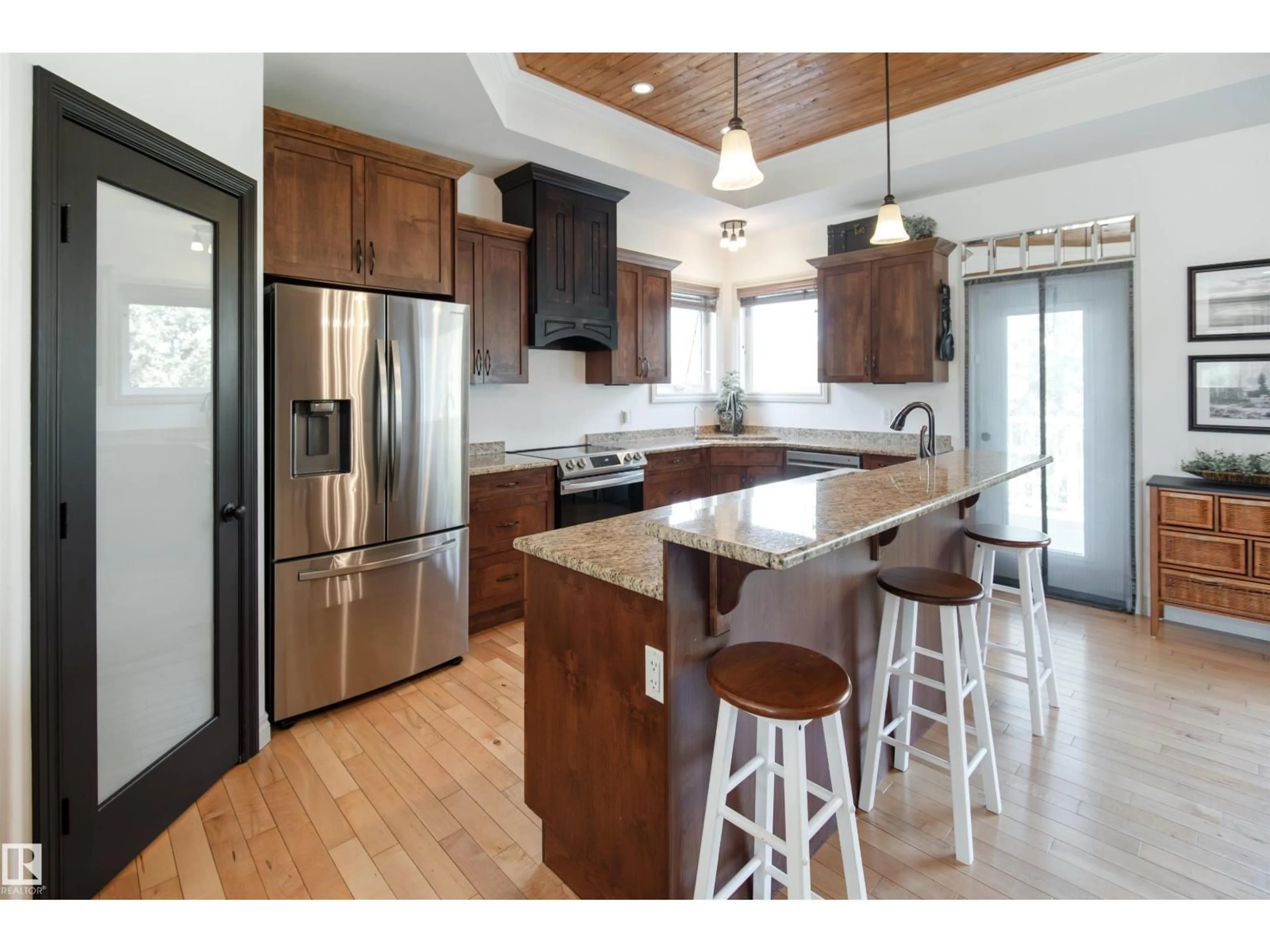 Open concept kitchen, wood/laminate floor for 6 - 61120 RR 465, Rural Bonnyville M.D. Alberta T9N2G9